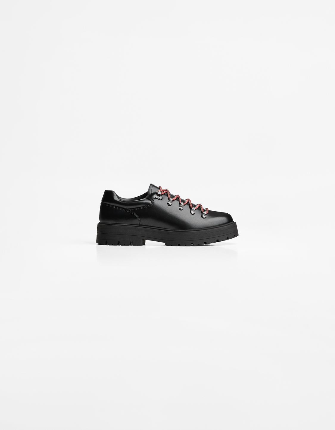 Shoes with metal details