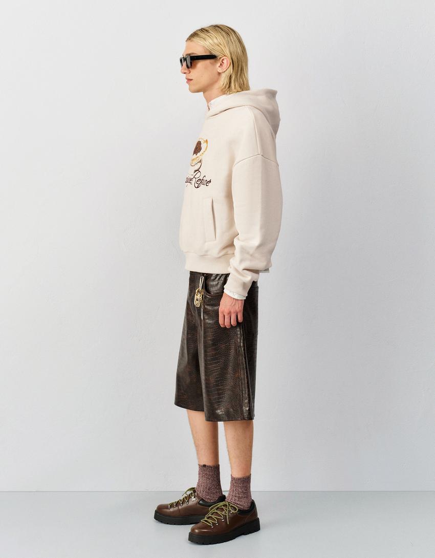Hoodie met geborduurde print-Ecru