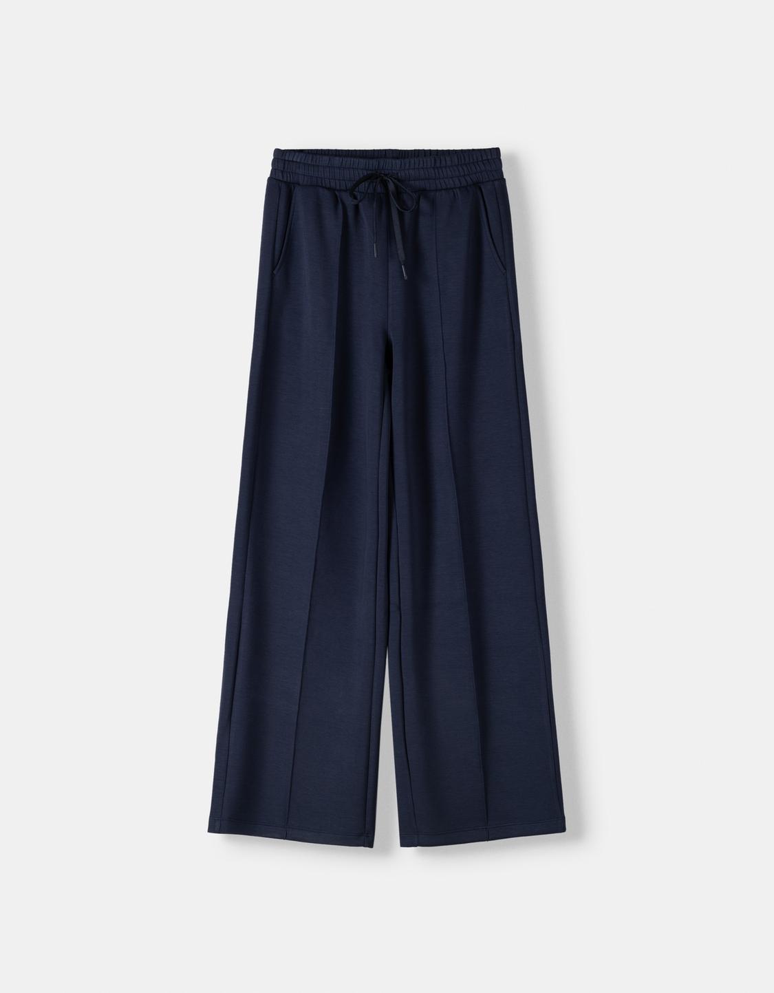 سروال ناعم بساق عريضة