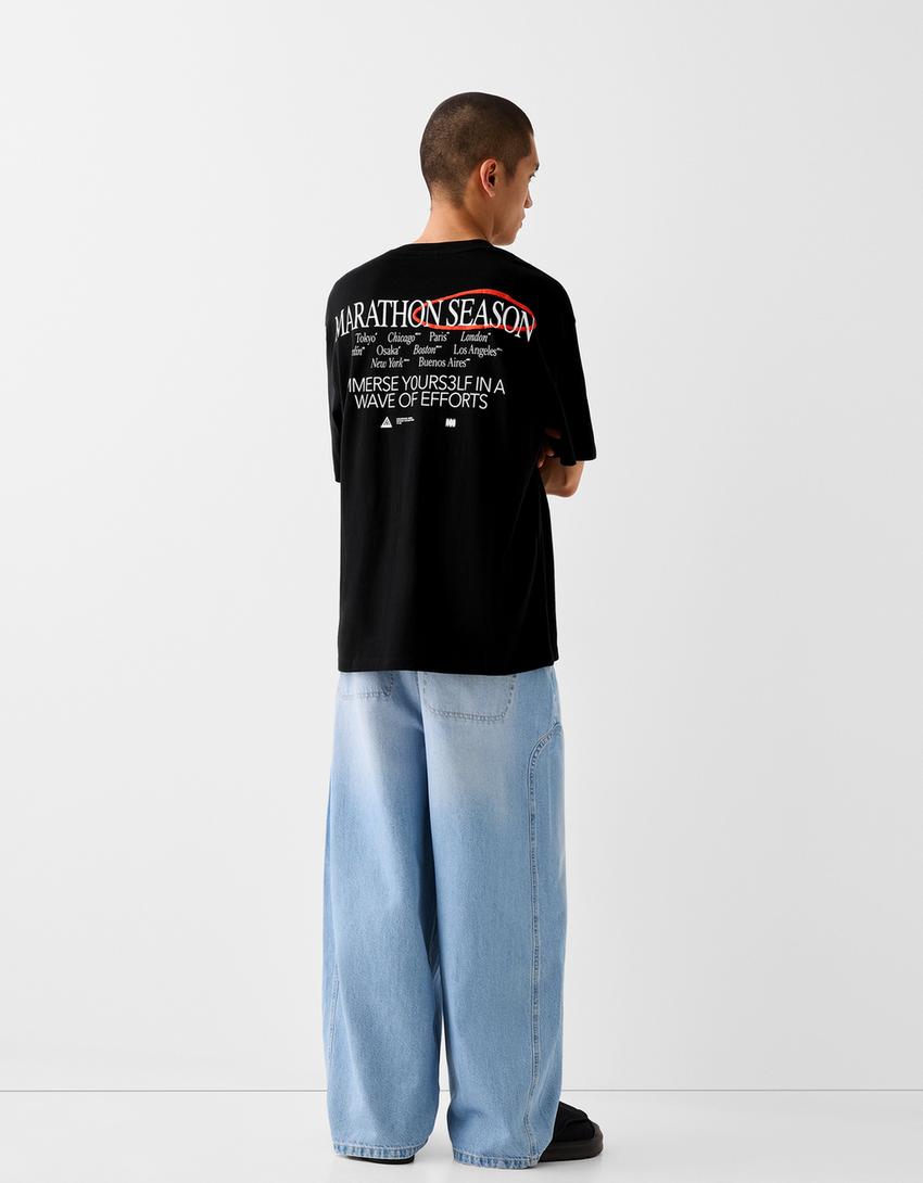 Camiseta manga curta boxy fit estampado-Negro-1