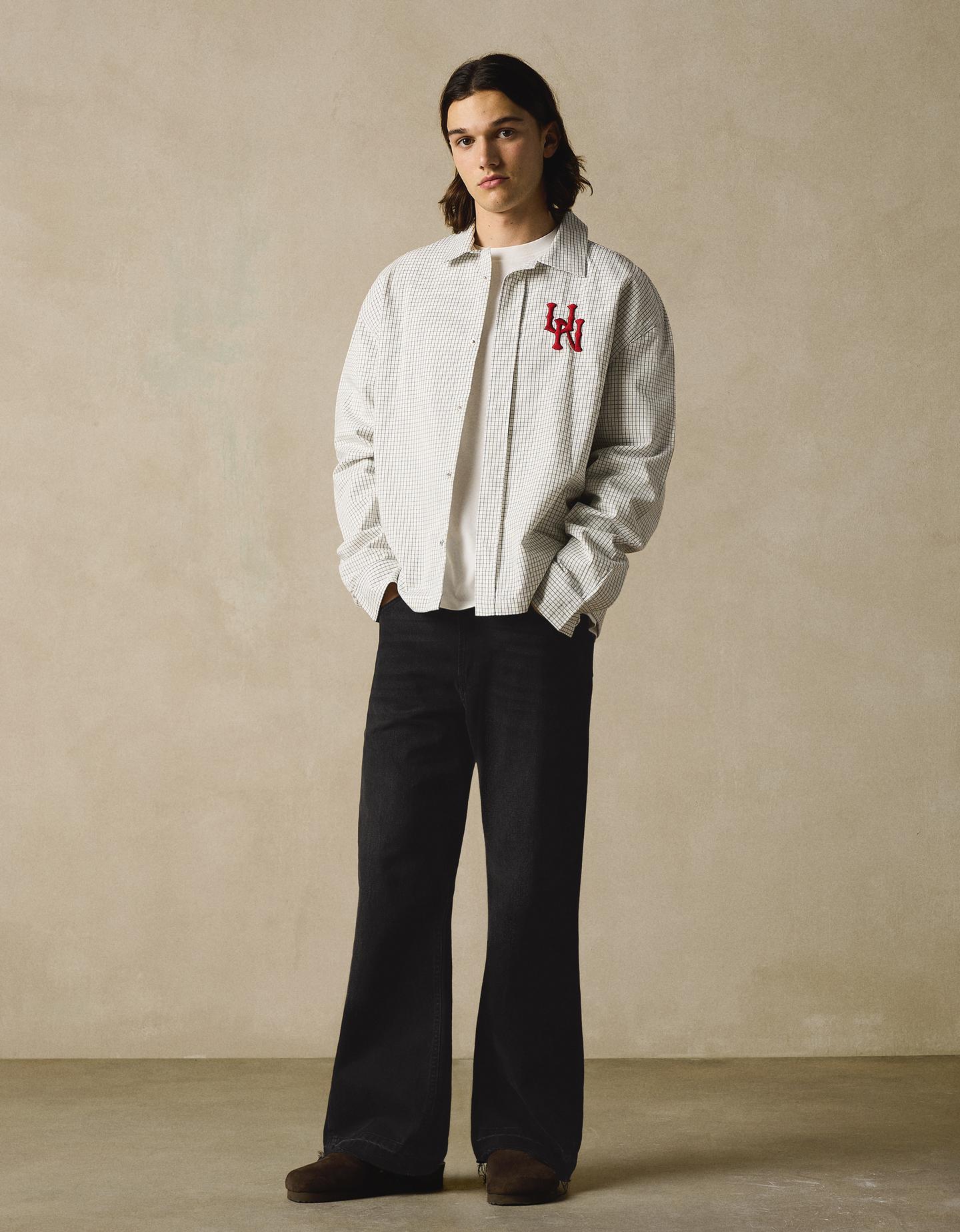 Bershka jeansy o kroju flare straight czarny
