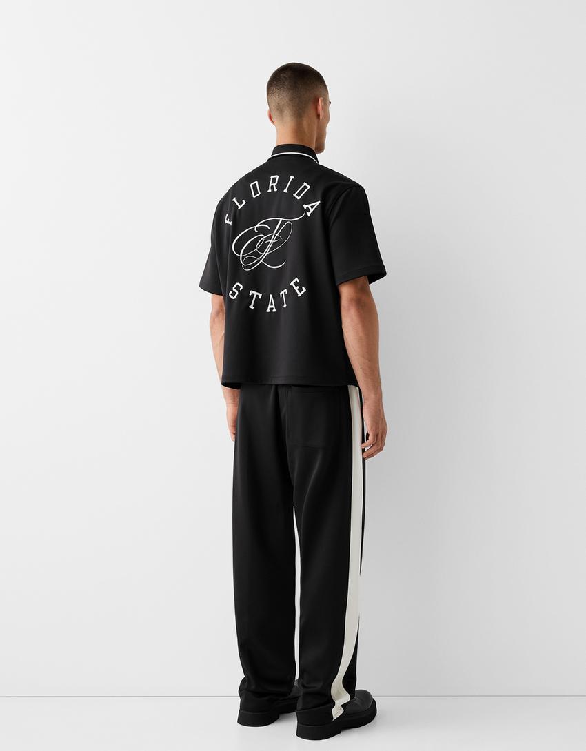 Short sleeve shirt with interlocking detail-Black