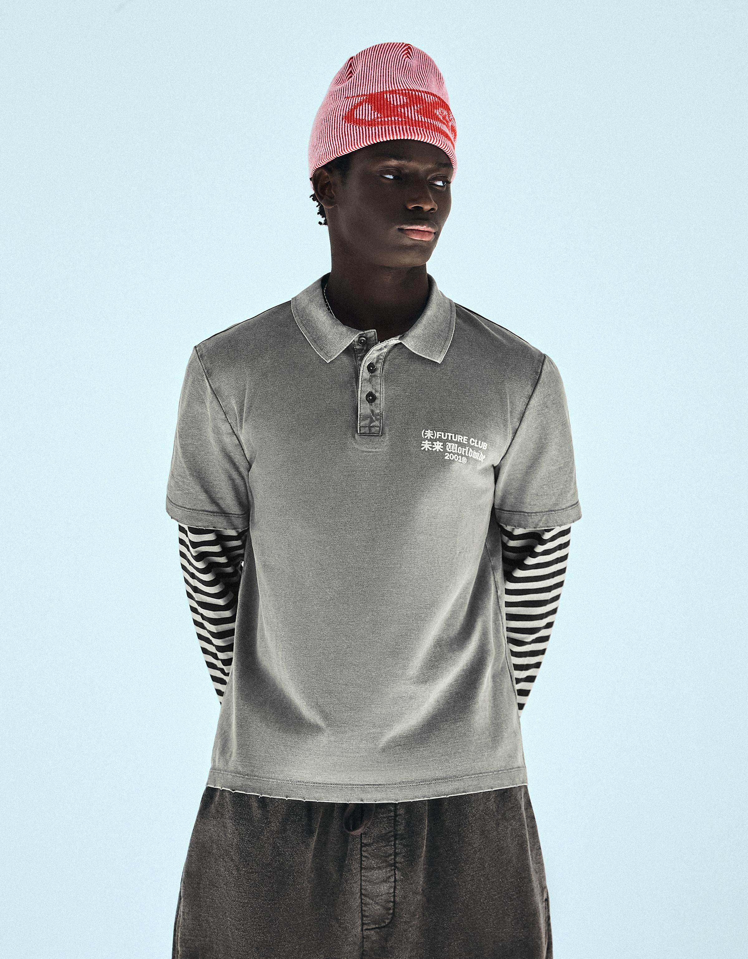 Polo efecto doble manga rayas