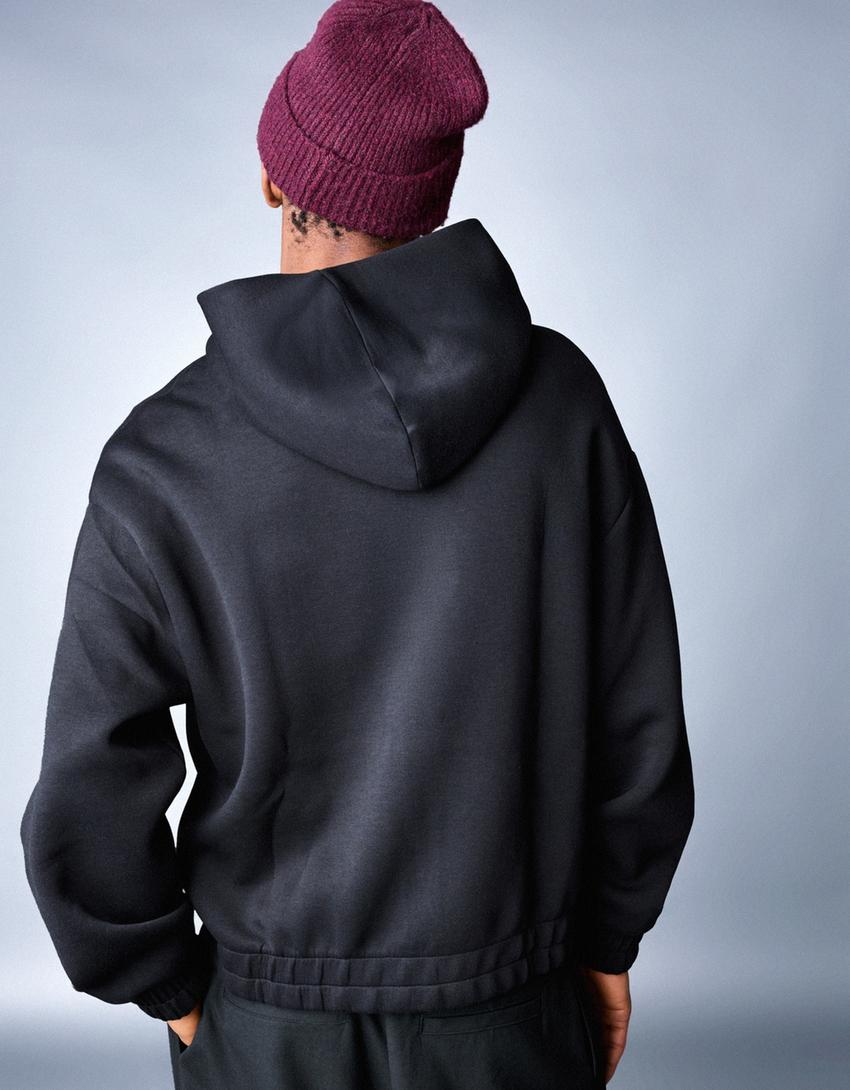 Felpa con cerniera e cappuccio effetto neoprene