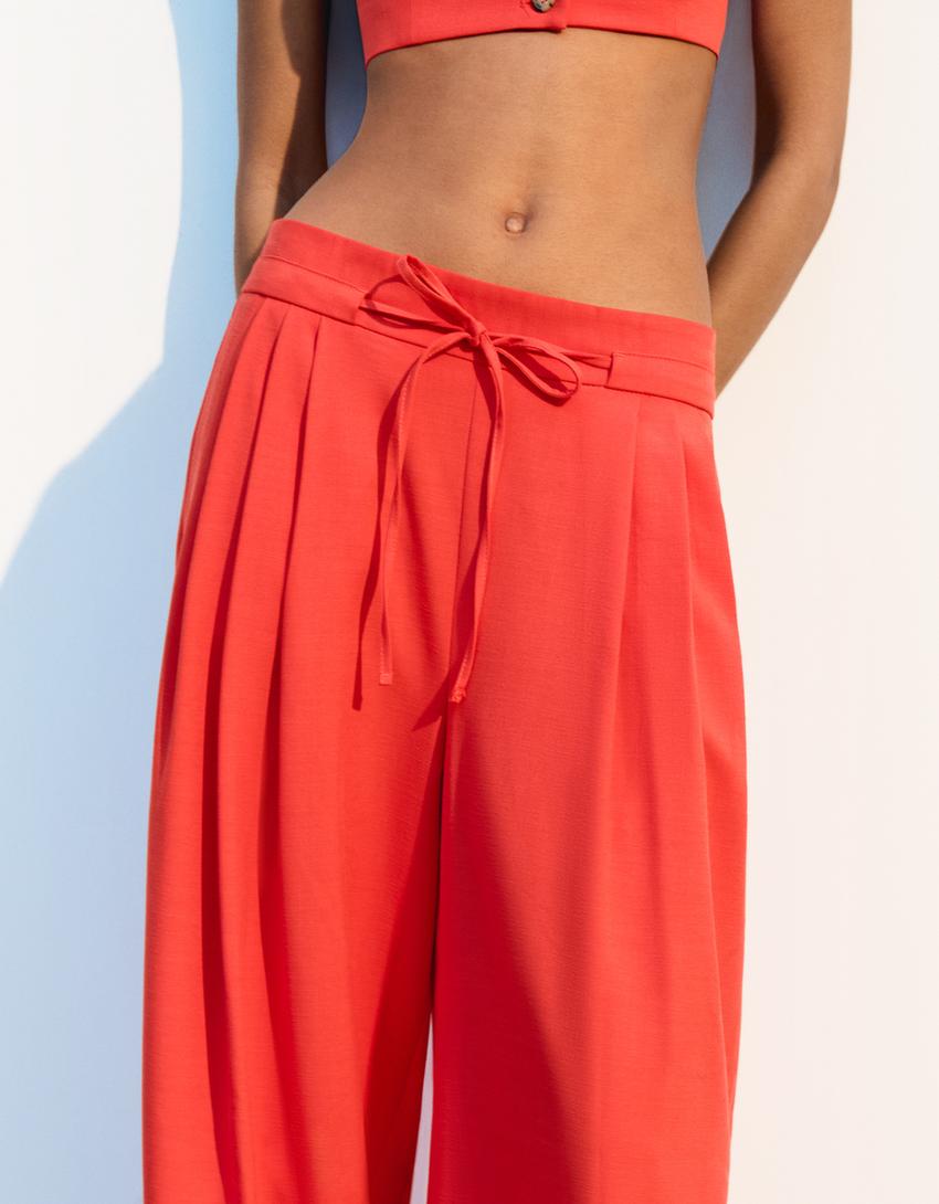 Flowing wide-leg trousers with pleats-Red-2