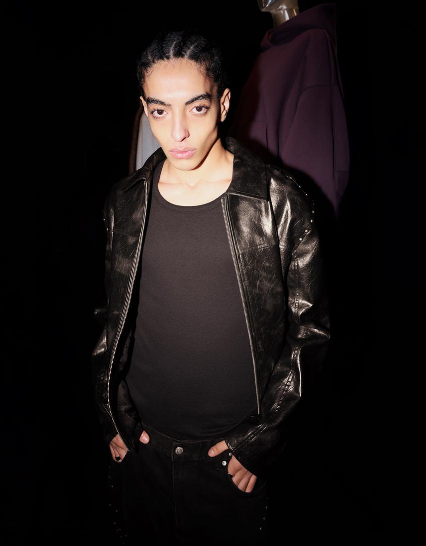 Casaco polipele tachas-Preto