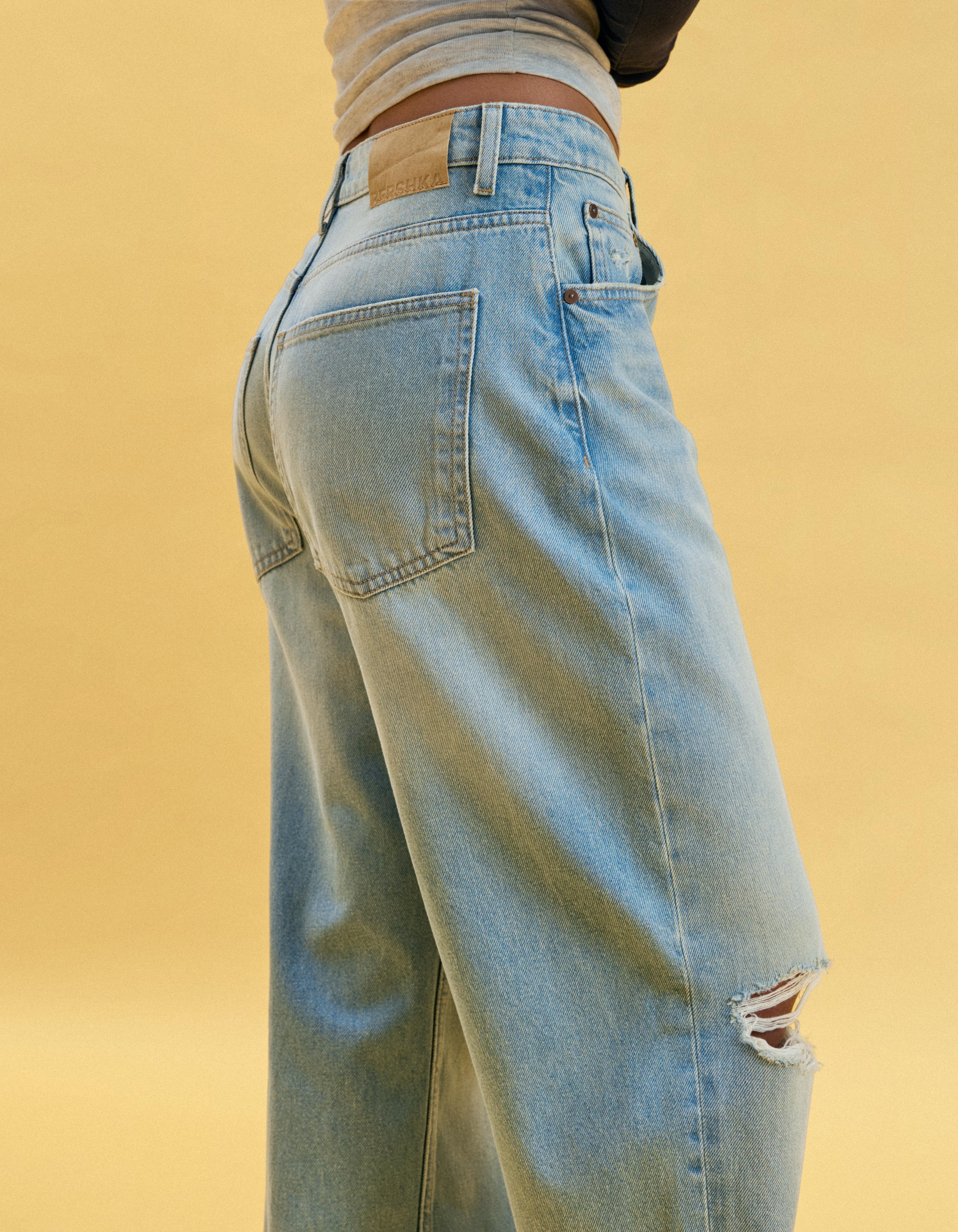 Ripped barrel loose jeans — Light blue
