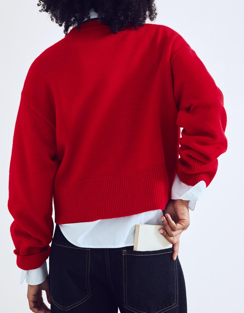 Pull oversize à bord-côte-Rouge