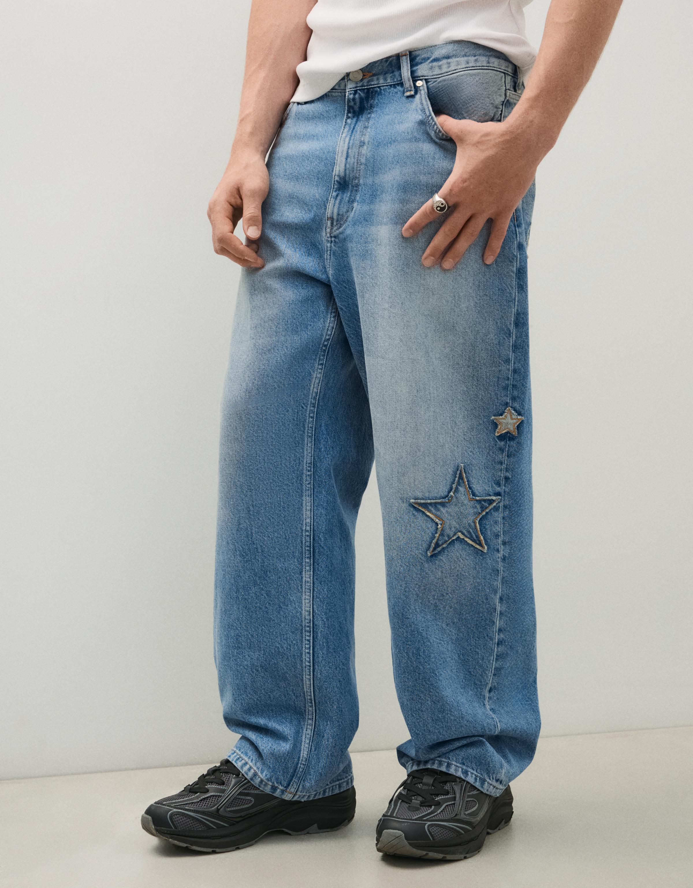 Baggy jeans with star patches — Light blue