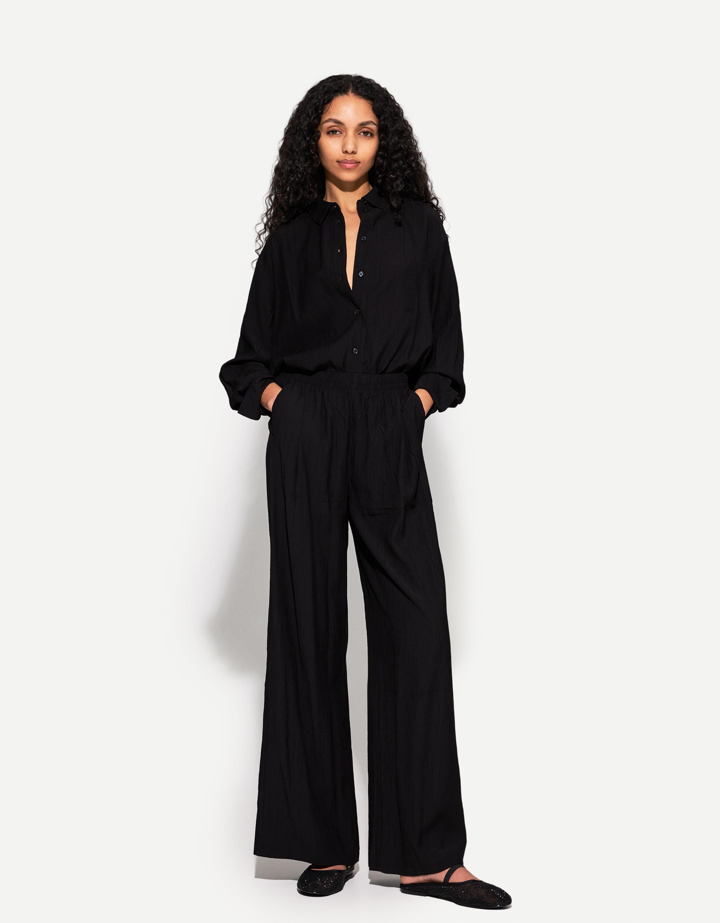 Flowing wide-leg textured trousers with drawstring — Black
