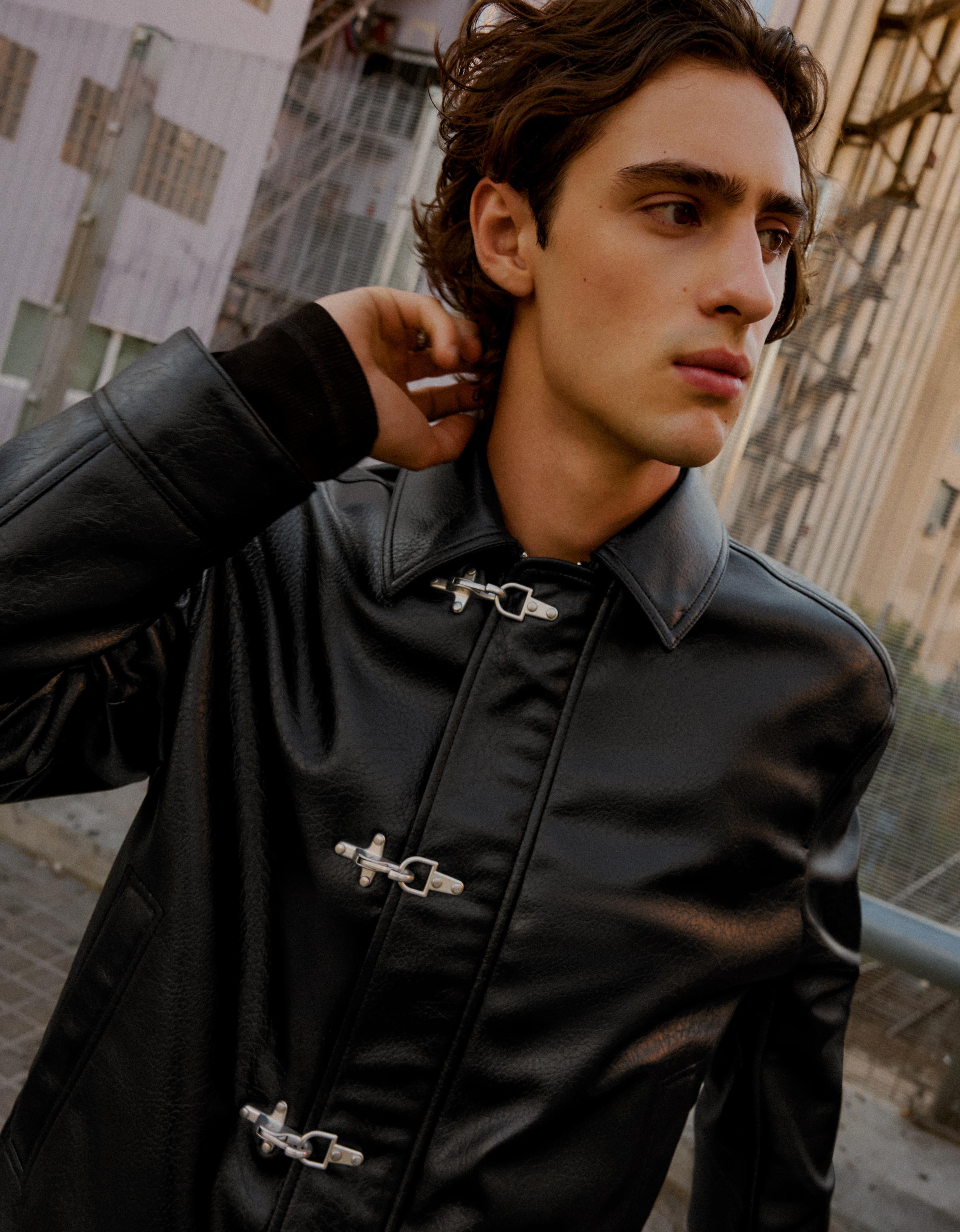 Leather effect jacket with clasps — Black