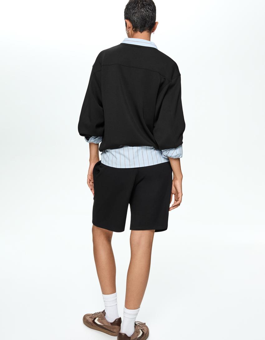 سويت شيرت فضفاض من مزيج مودال ناعم-أسود