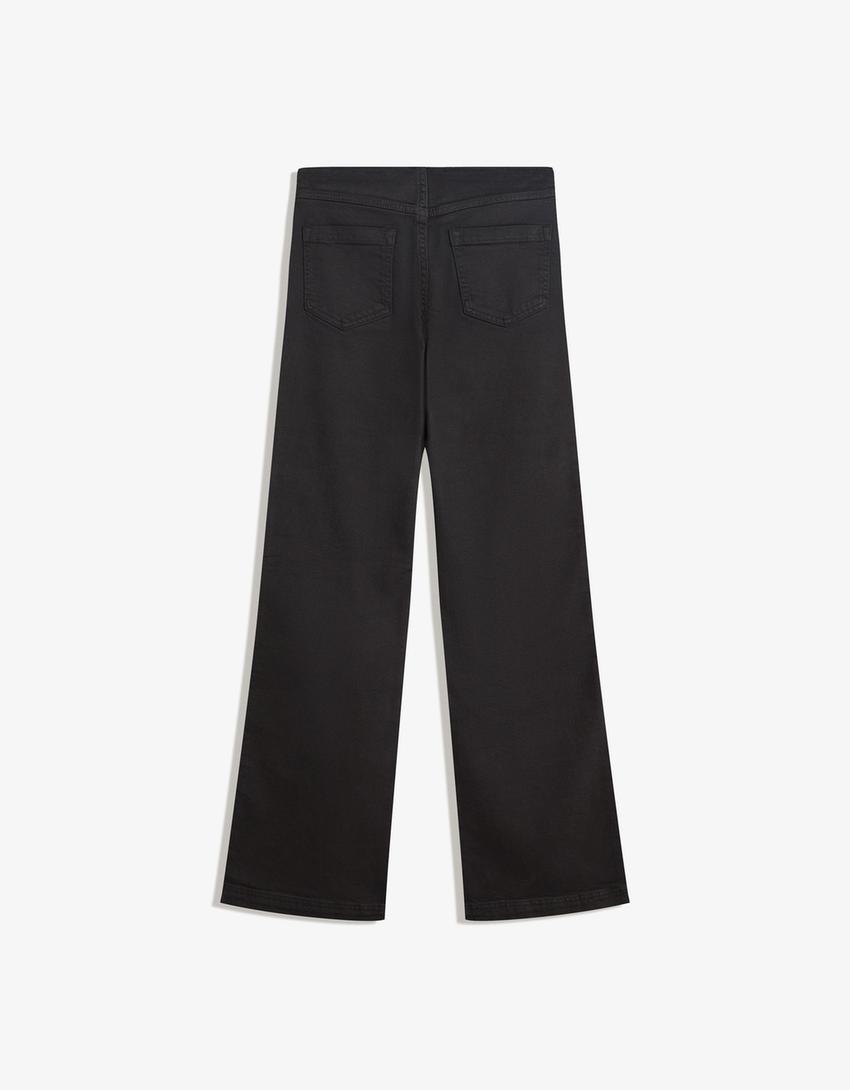 Trousers with studded waist and zip