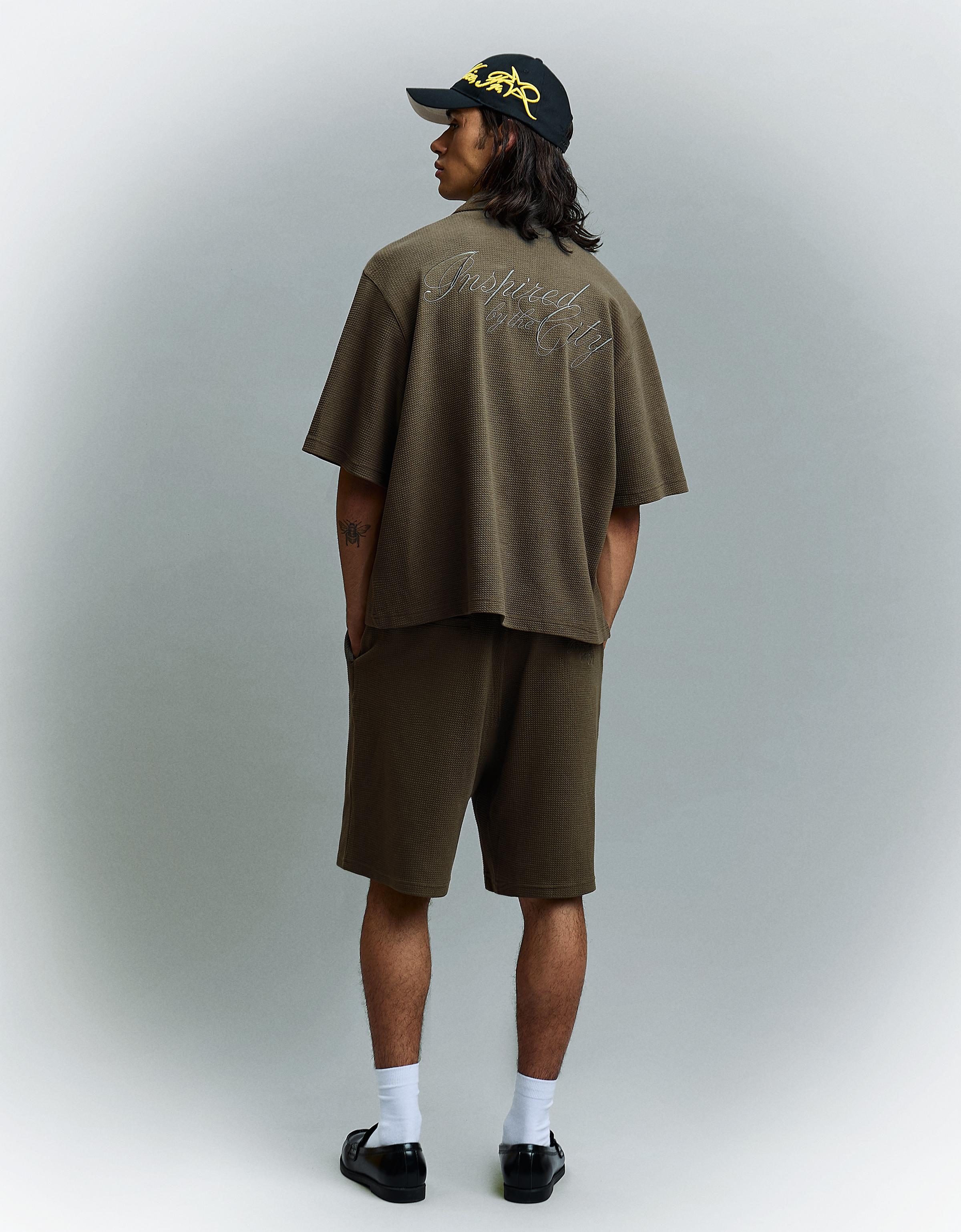 Waffle-knit skater Bermuda shorts