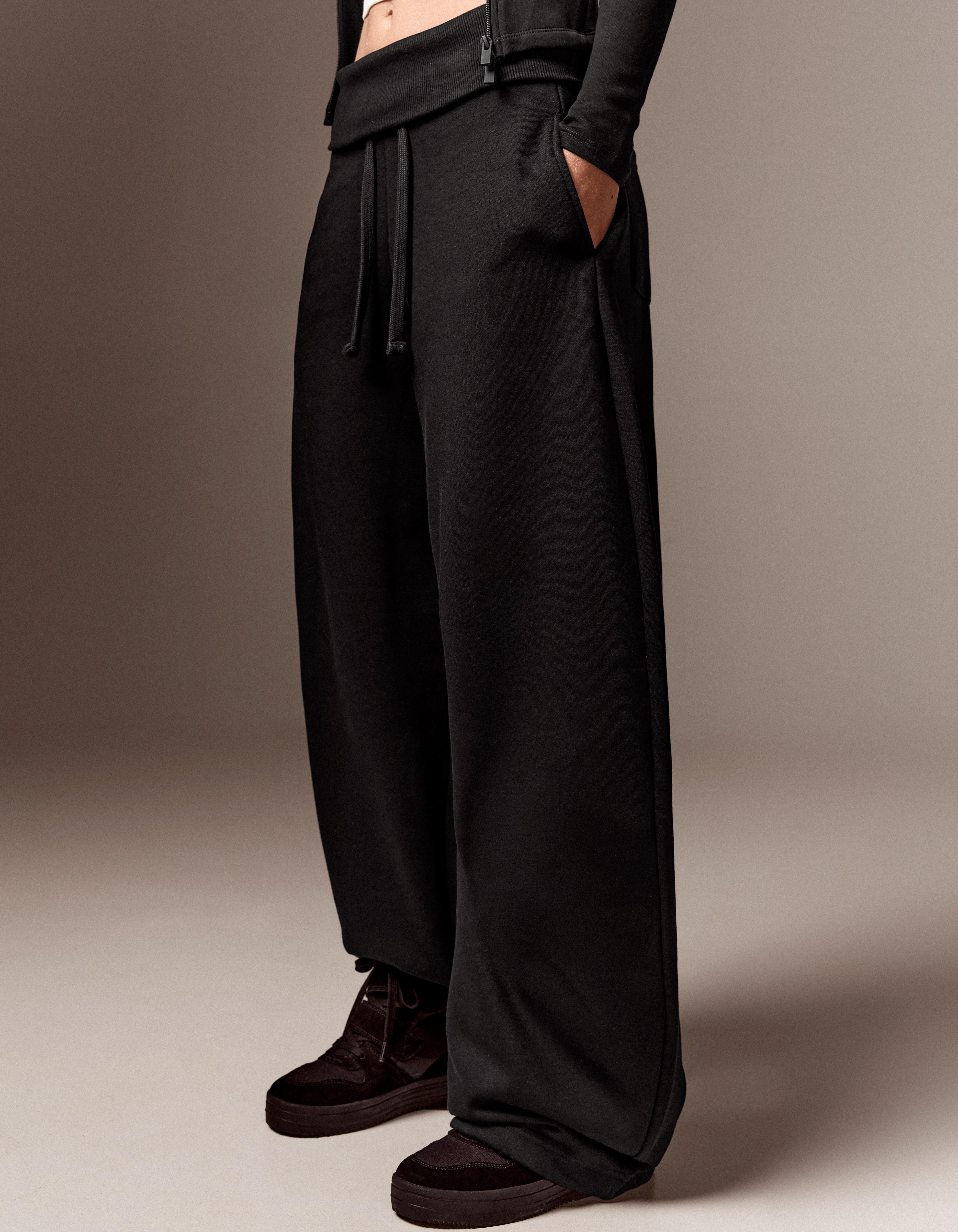 Barrel-leg jersey trousers with fold-over waist — Black