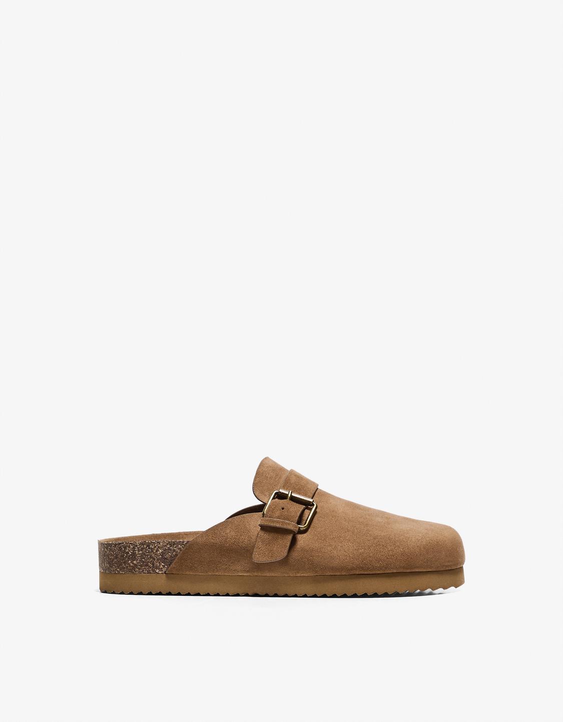 Buckled clogs with stud details