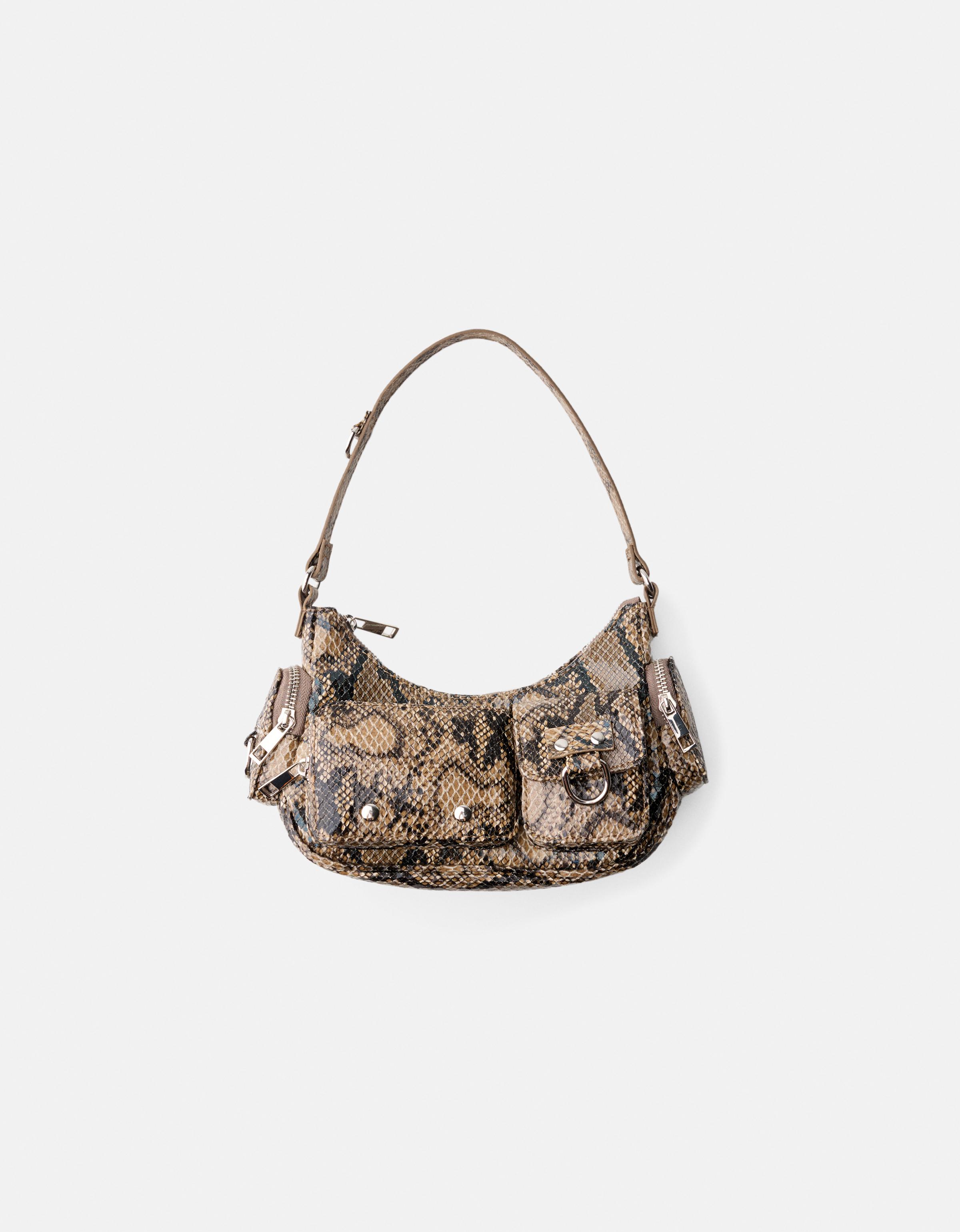 Leather effect multi pocket bag Women Bershka