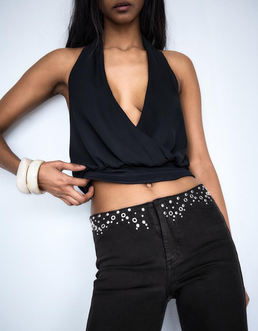 Pantalón cintura tachas-Negro