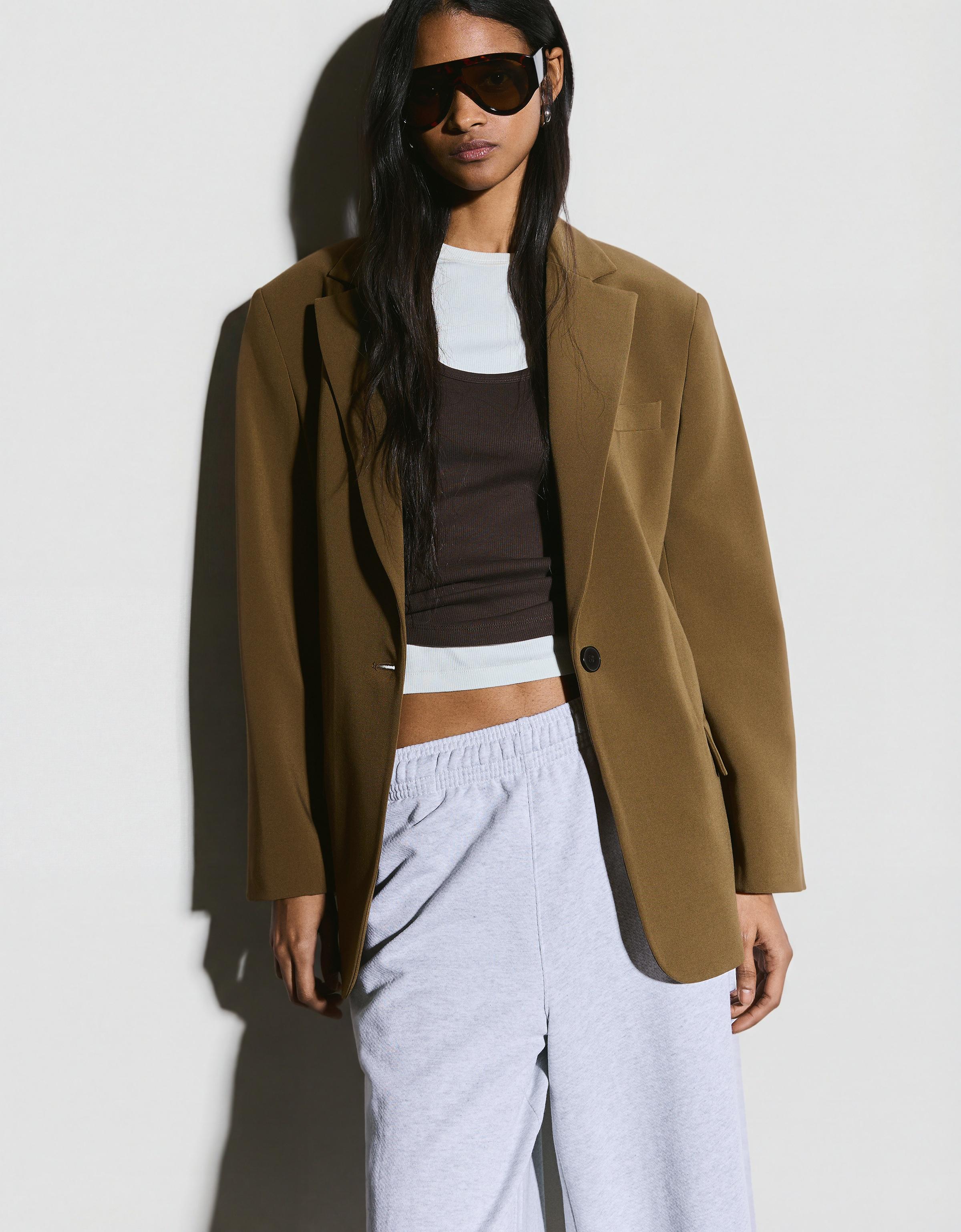 Blazer with back buckle
