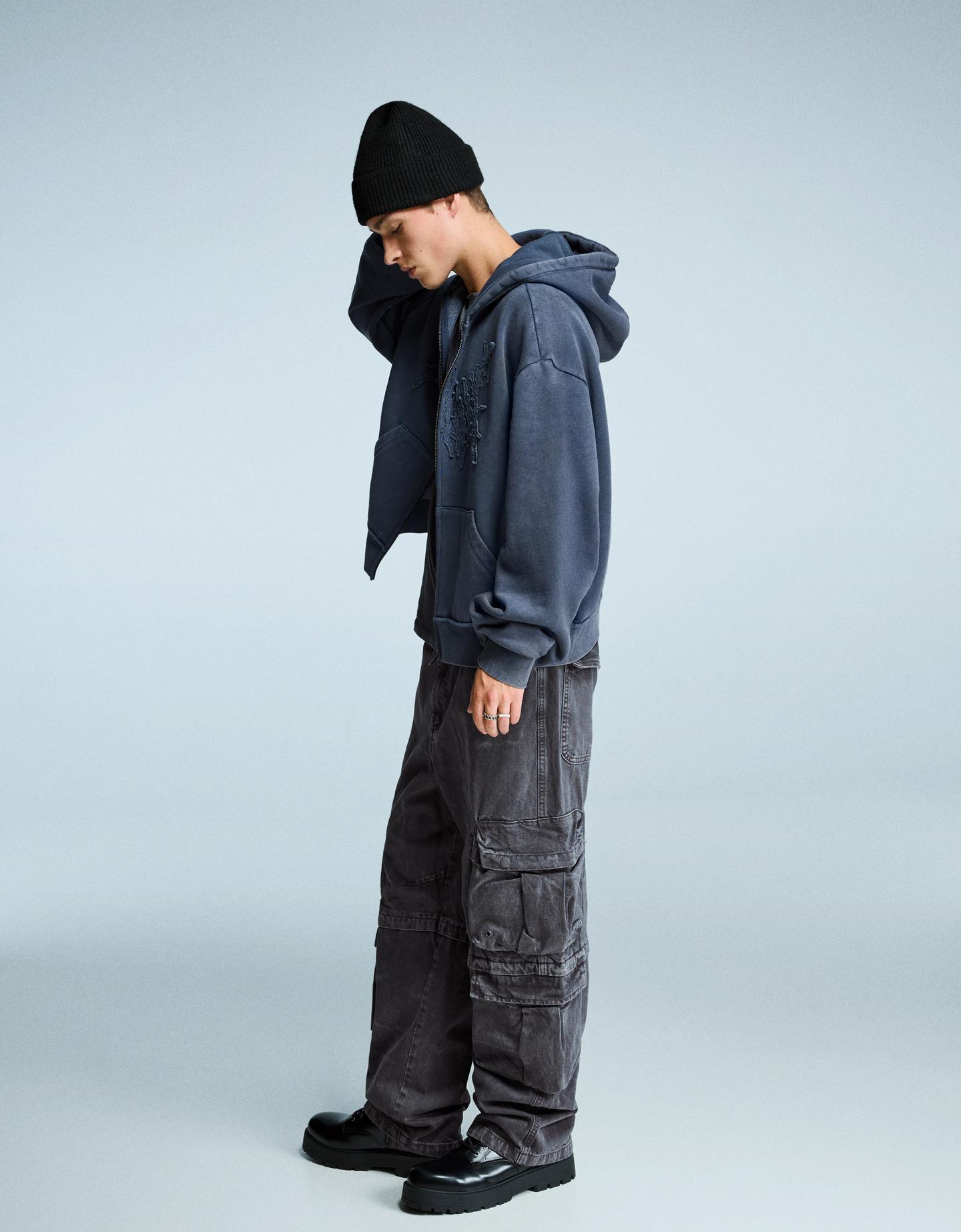 Bershka spodnie multi-cargo baggy z efektem odbarwienia czarny