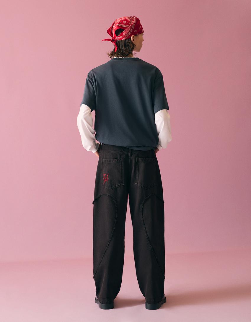 Pantaloni super baggy fit ricamati-Nero
