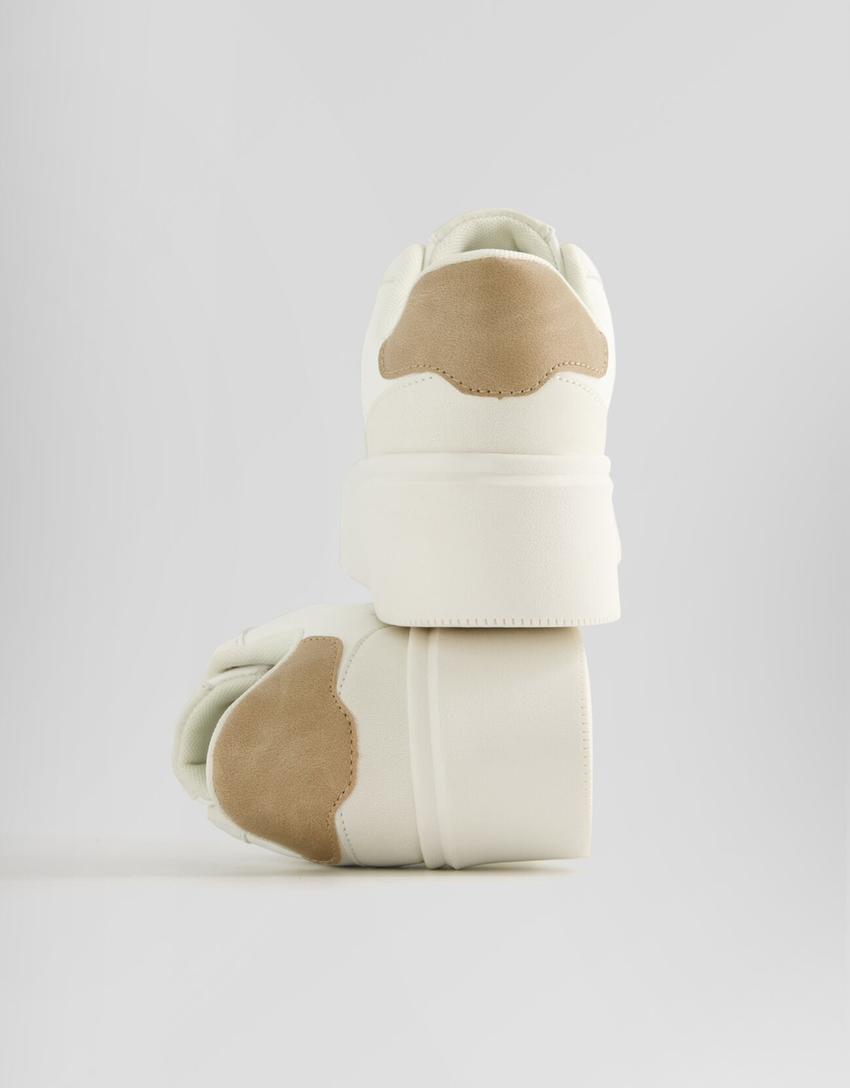 بنطلون رياضي جينز بنعل عال وتفصيل كعب-أبيض