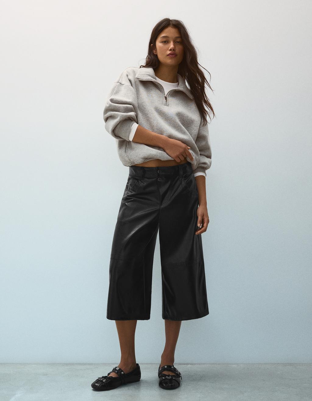 Leather effect double button Bermuda shorts