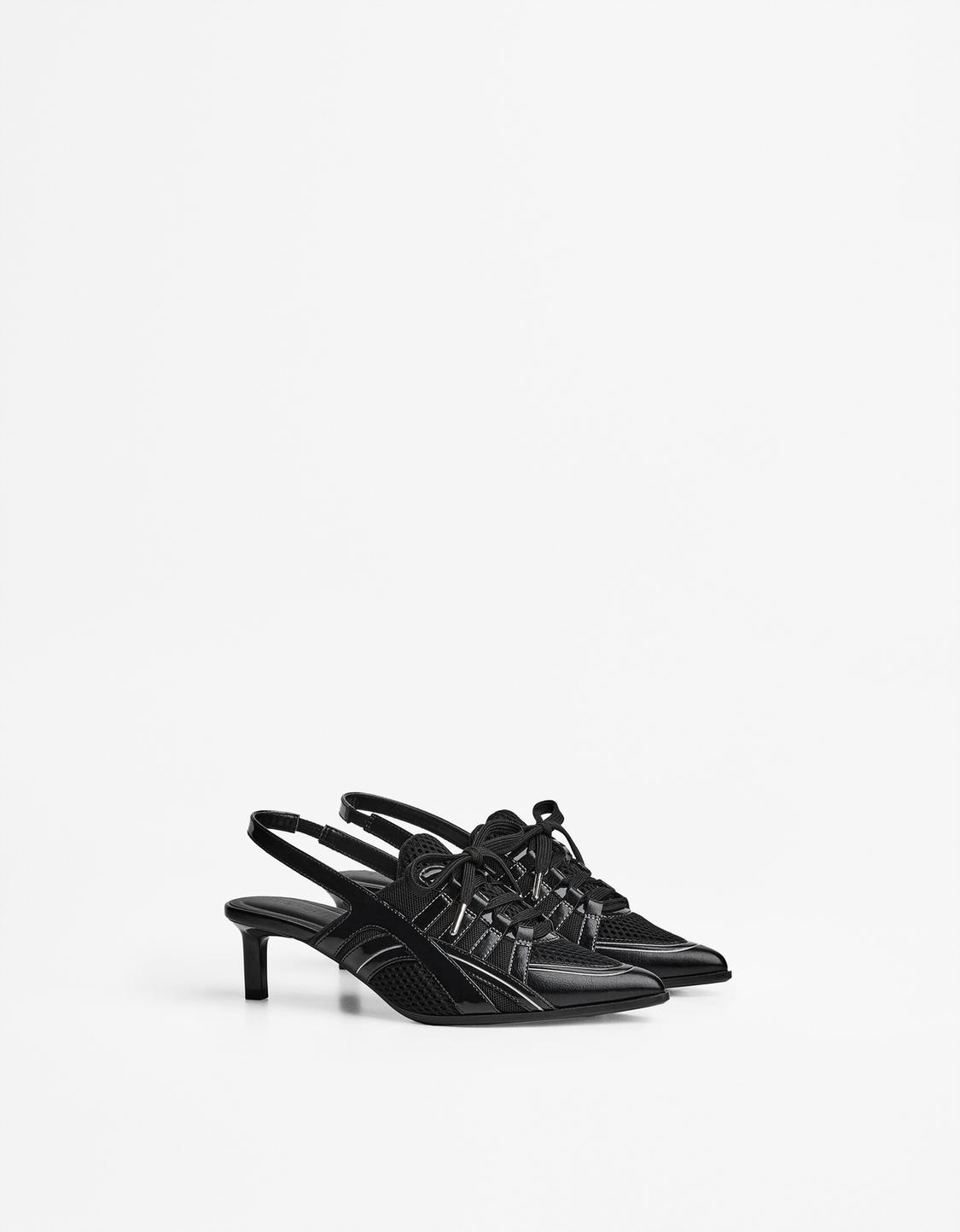 Slingback high-heel football shoes