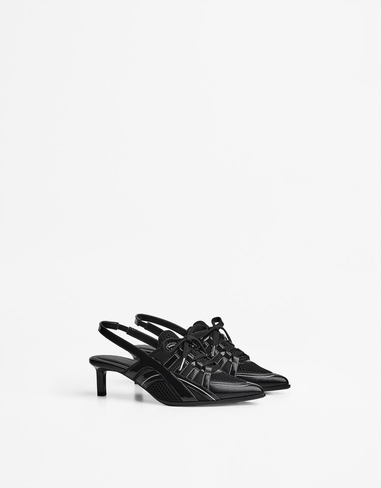 Slingback high-heel football shoes