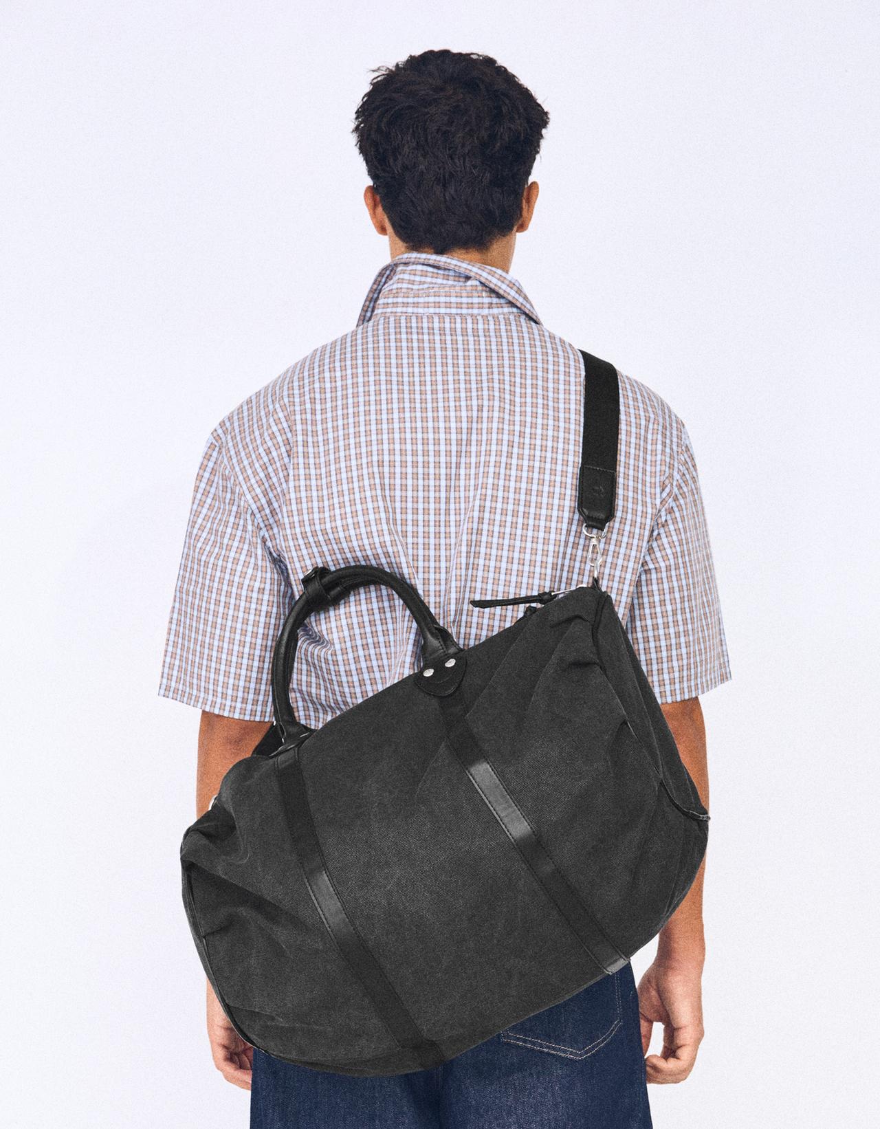 Woven travel bag — Black