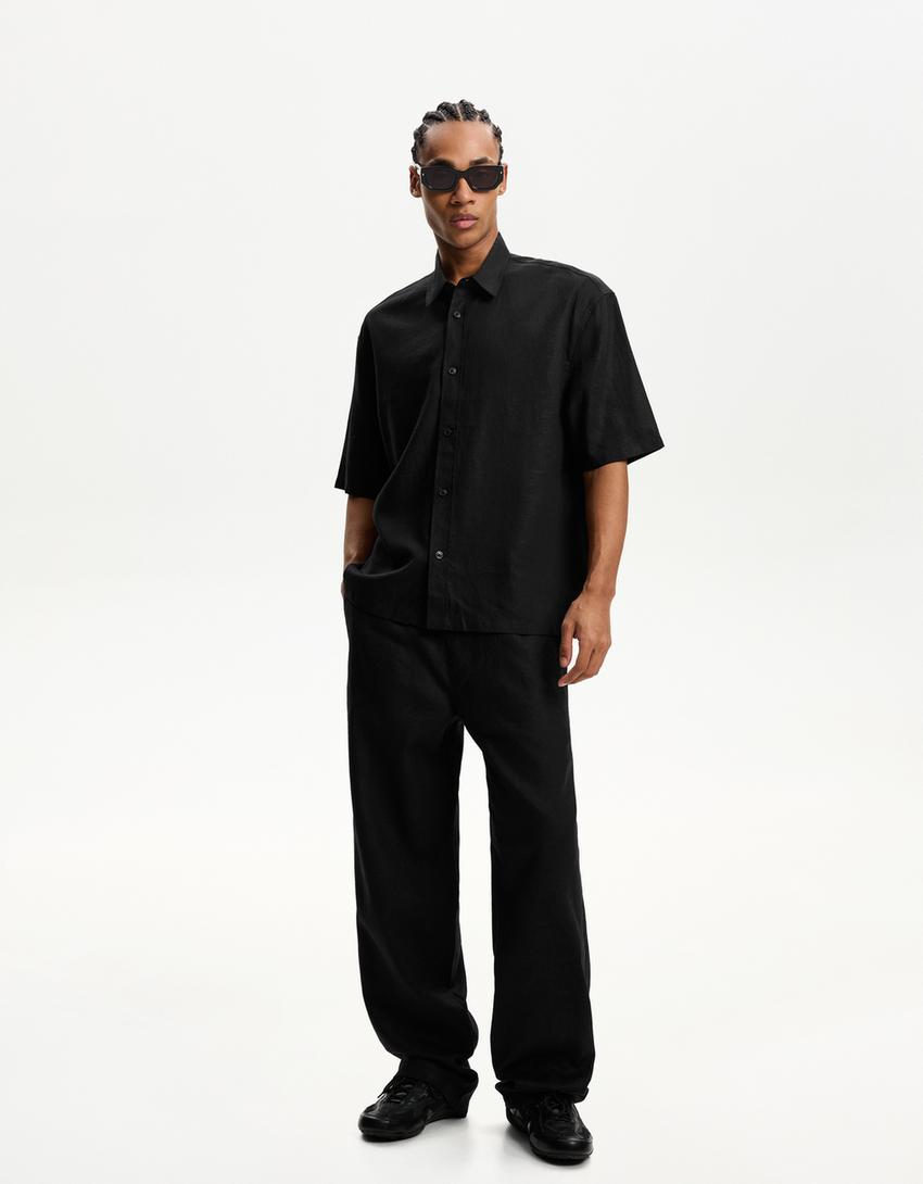 بنطلون رياضي بمزيج كتاني وساق عريضة-أسود