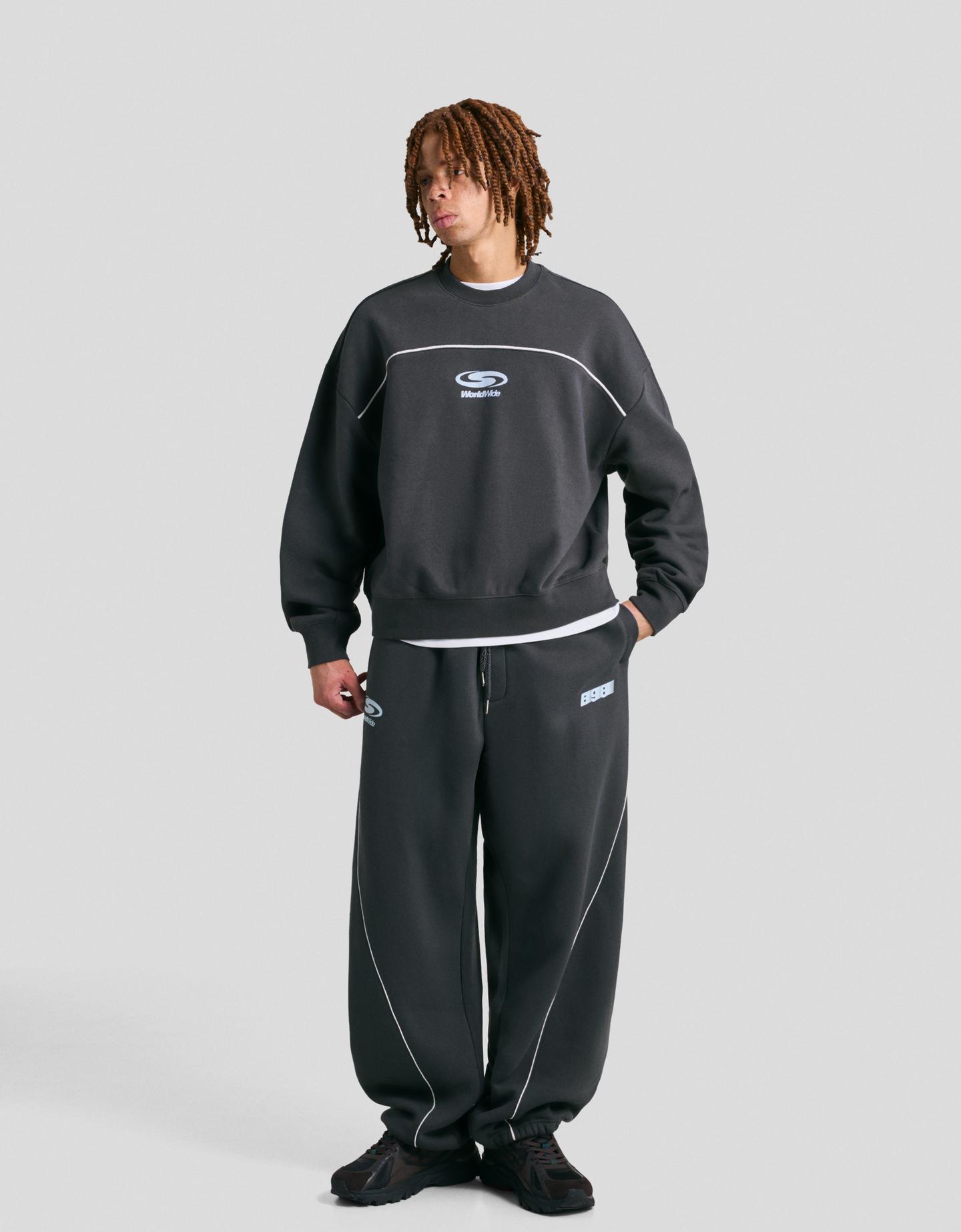 Bershka spodnie o kroju balloon z nadrukiem niebieski