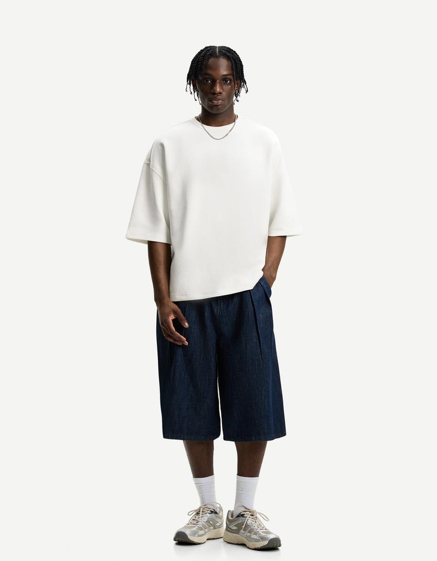 Oversize Interlock T-Shirt mit kurzen Ärmeln-Grbrochenes Weiss