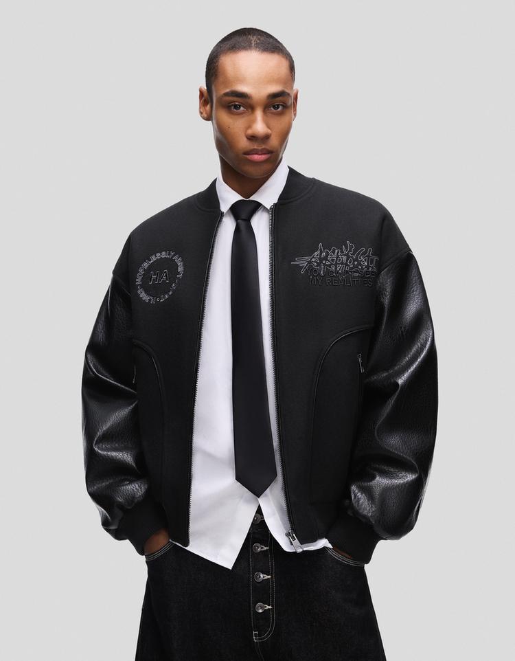 Cloth jacket with leather effect sleeves