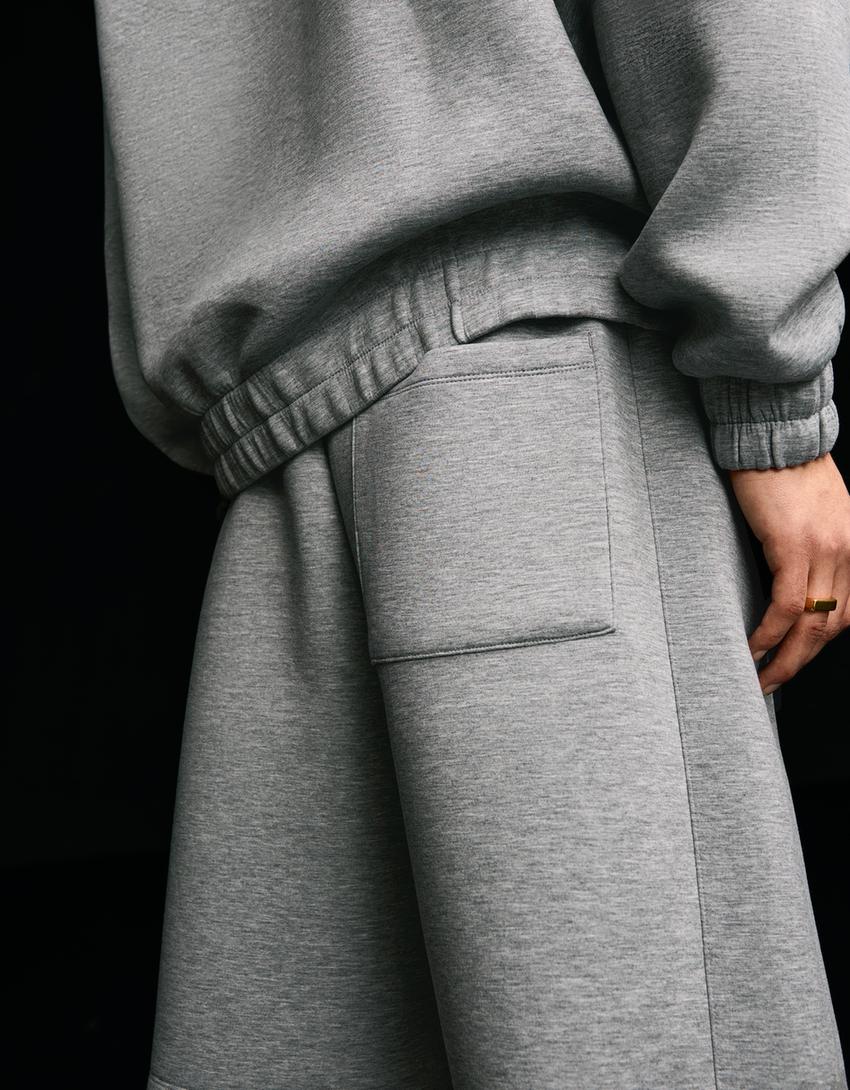 Oversize neoprene-effect Bermuda shorts