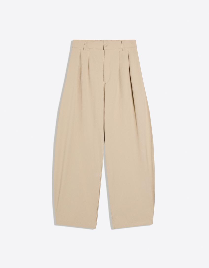 Plisowane spodnie o kroju superbaggy semijogger-Piaskowy