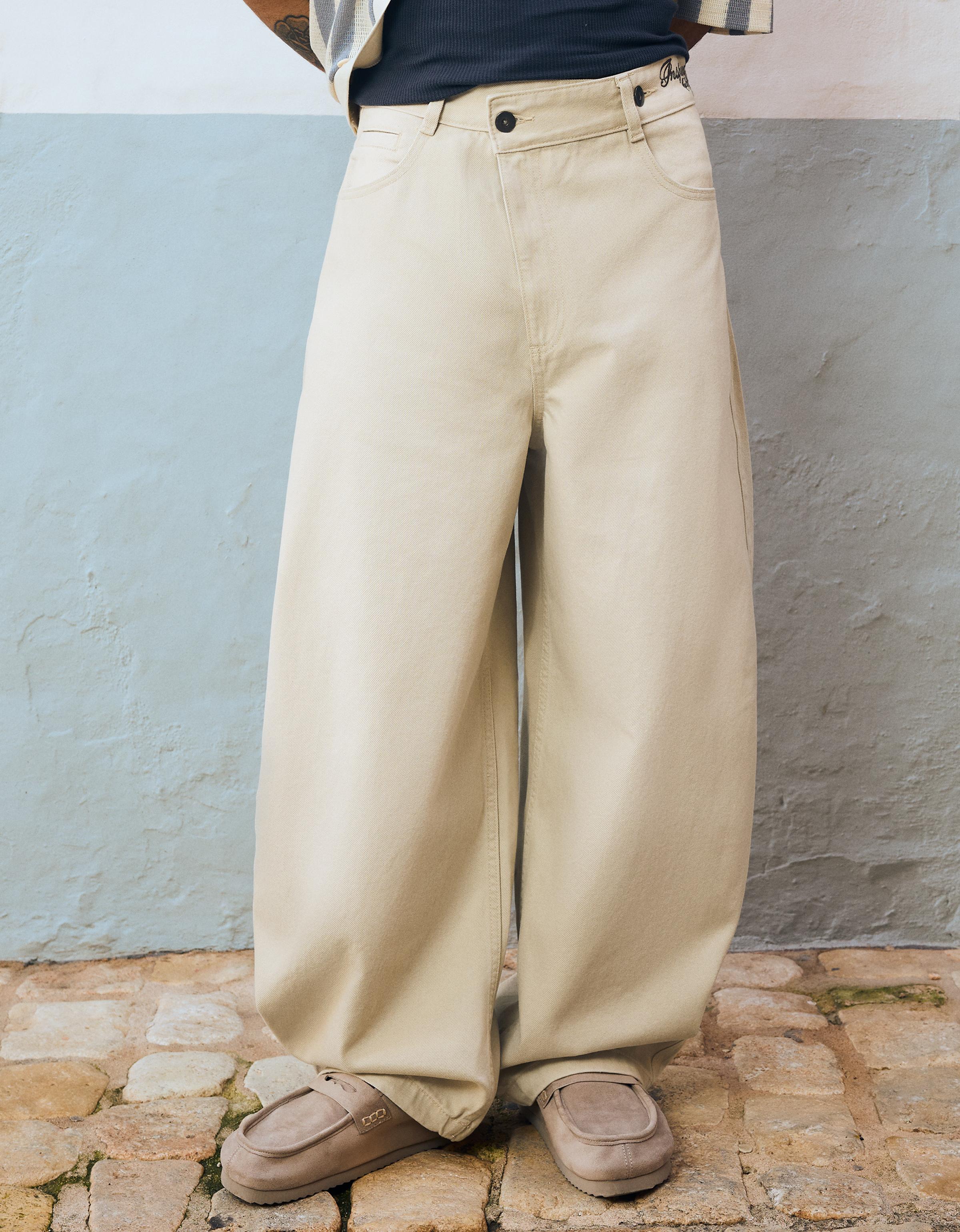 Embroidered crossover barrel trousers — Sand