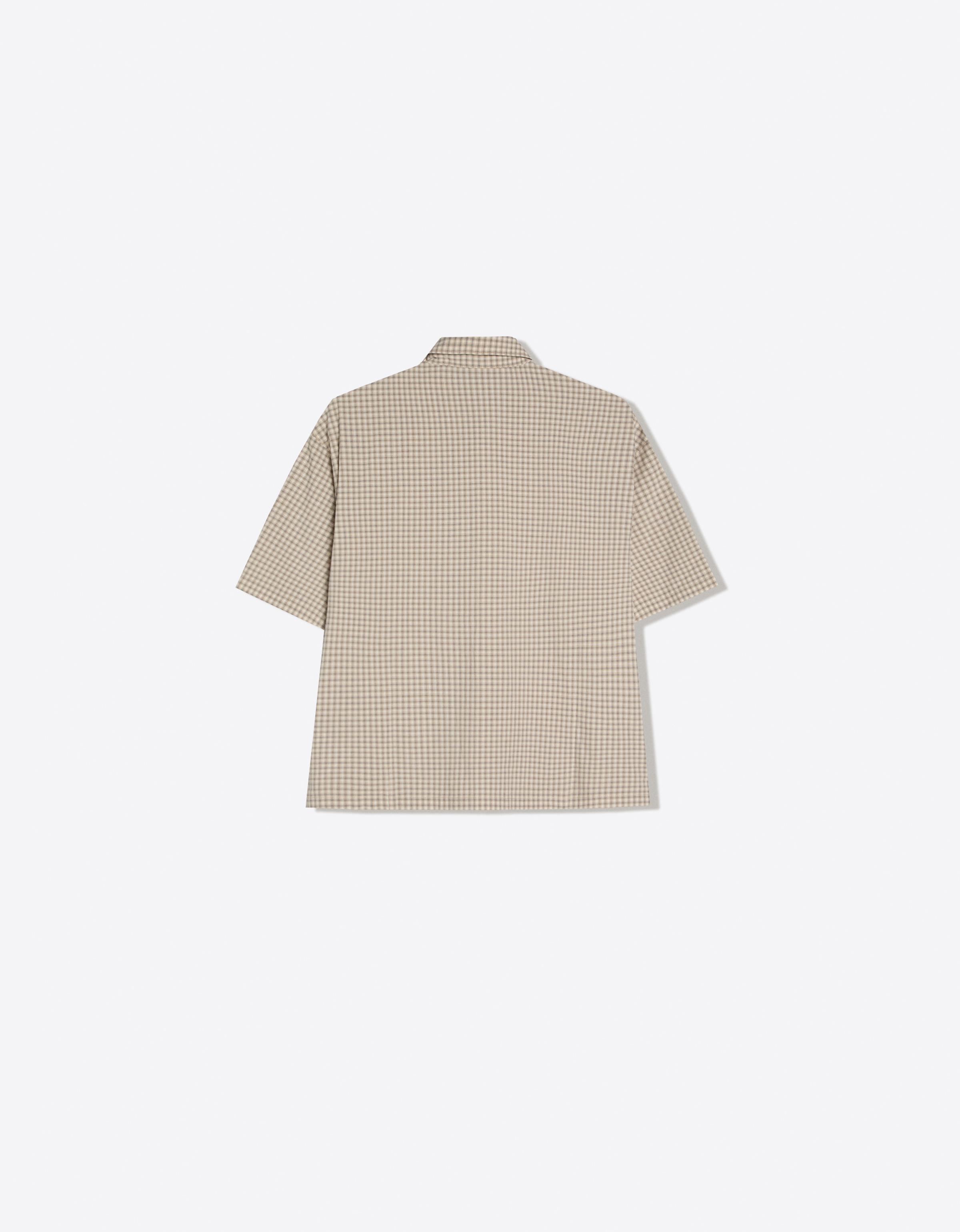 Short-sleeved clasp shirt — Beige