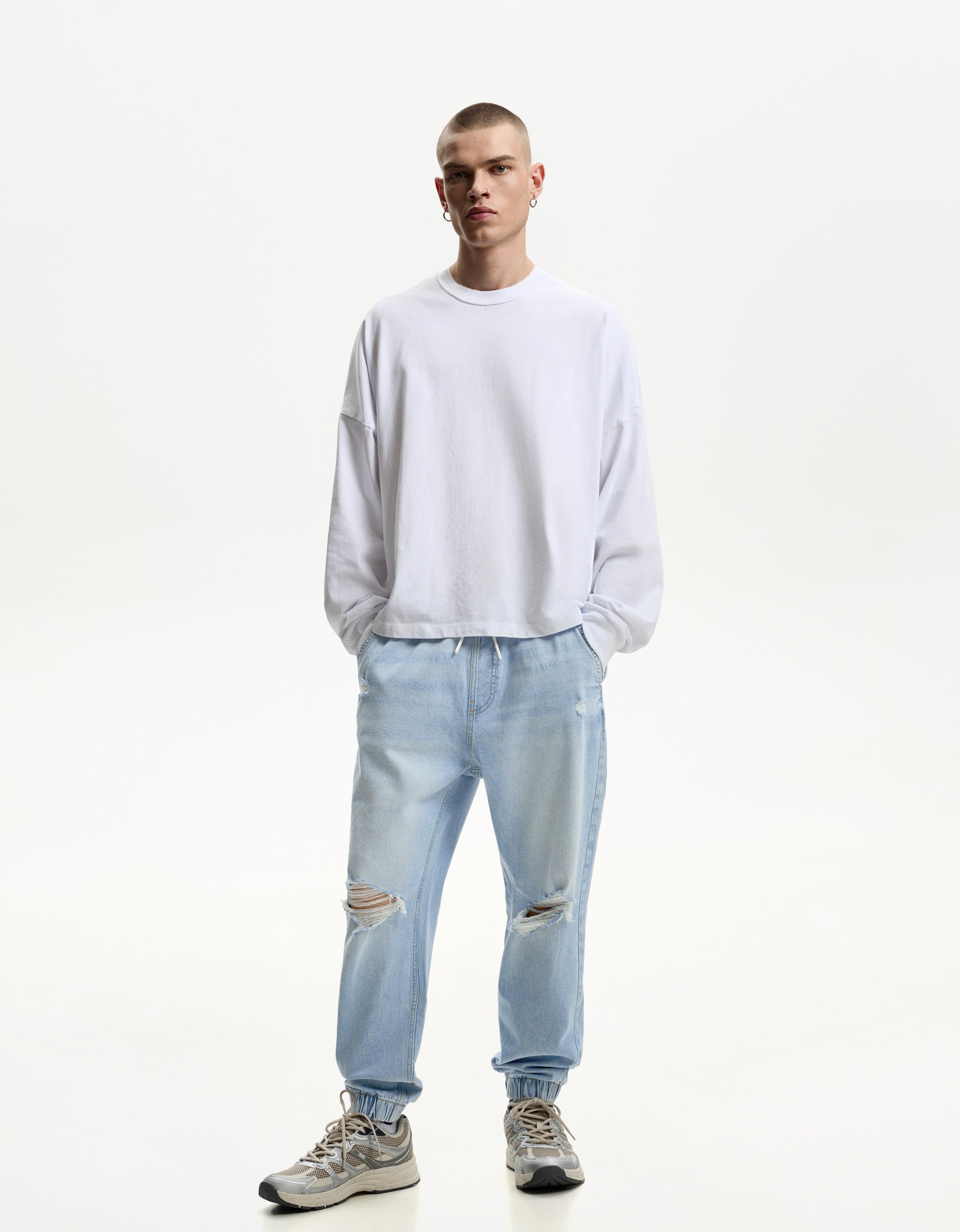 Thumbnail - Bershka Jogger-Jeans Mit Zierrissen Herren Xxs Hellblau