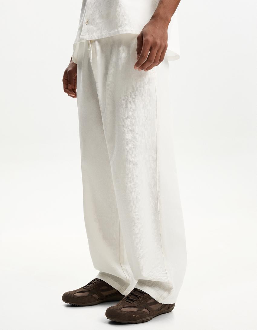 Pantalón baggy jogger plisado-Blanco roto