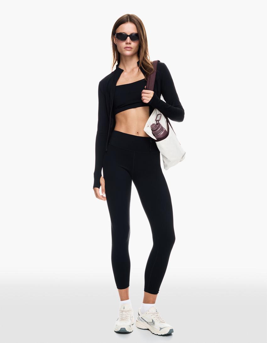 Sneldrogende en ademende sweater met rits-Zwart
