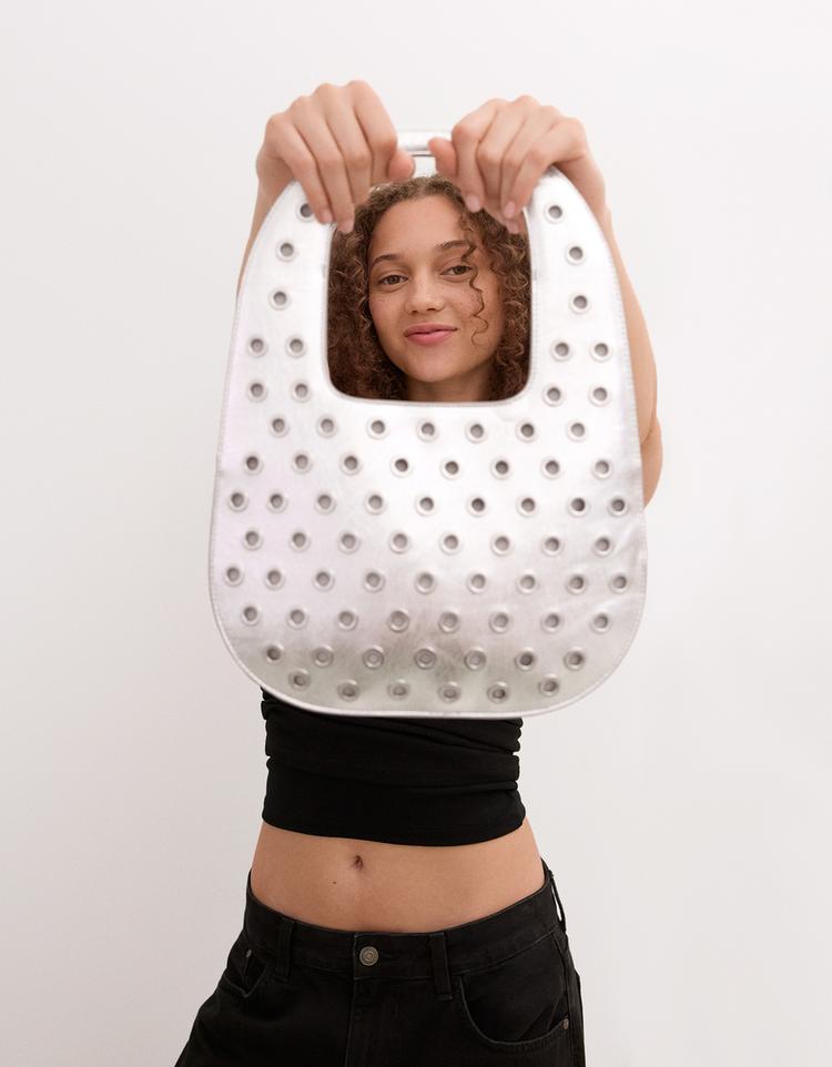 Mini bag with eyelets