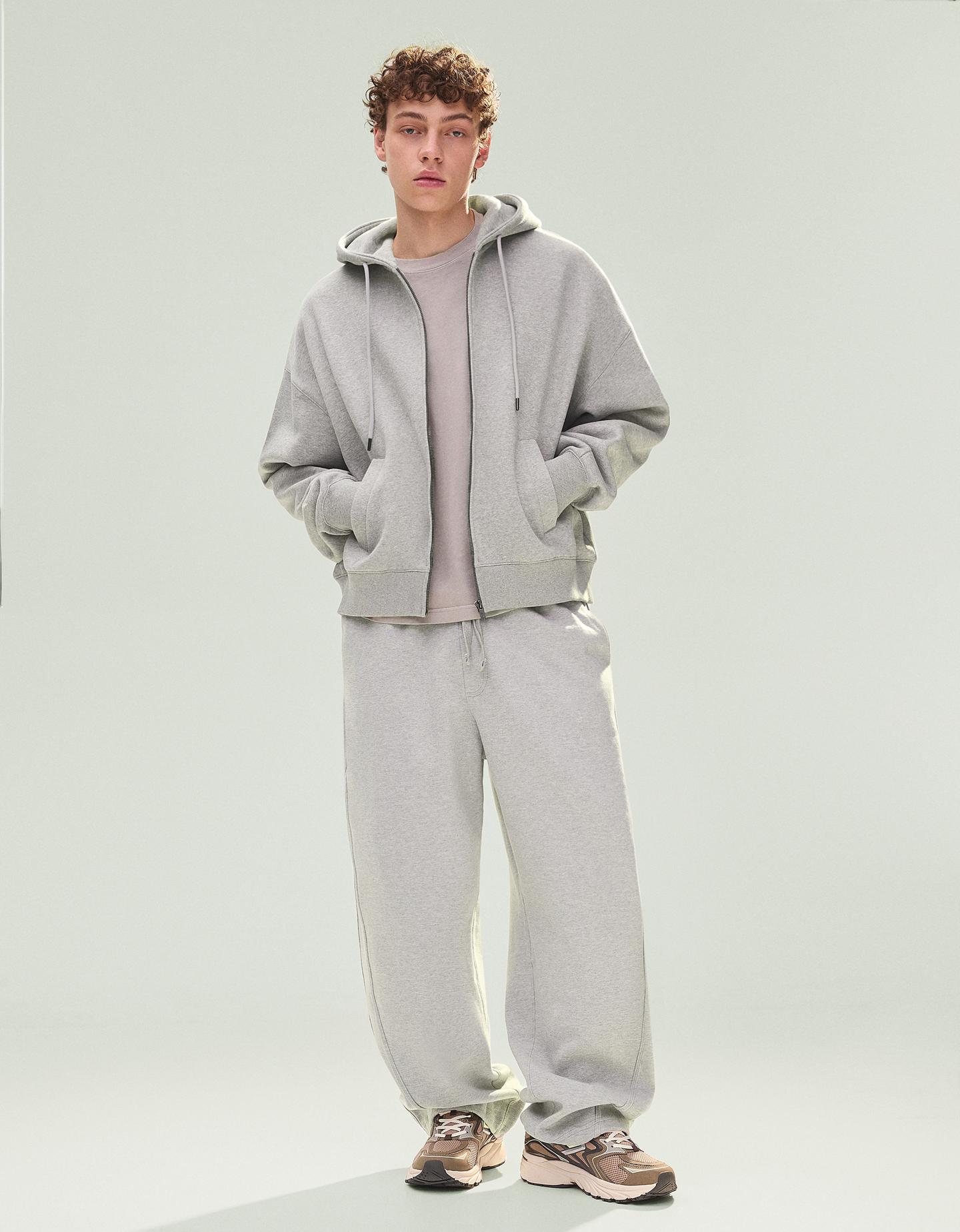 Bershka spodnie o kroju balloon z dzianiny interlock szary