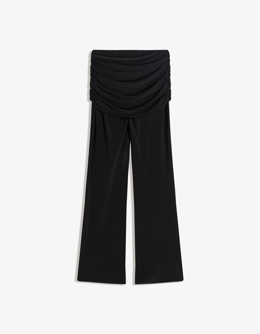 Pantalons flare drapat flor-Negre