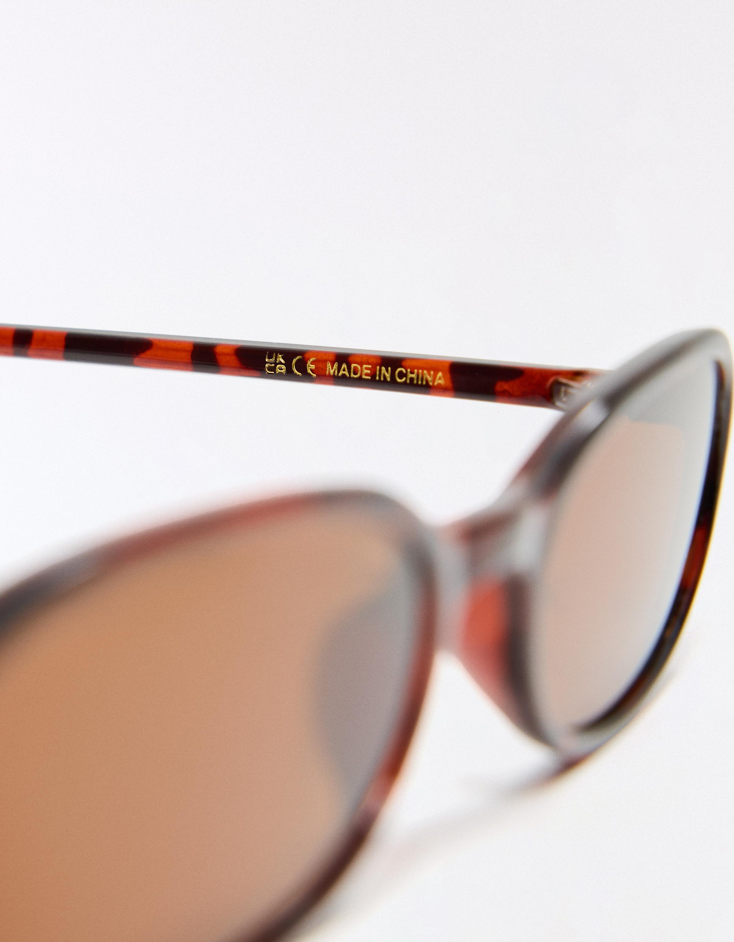 Oval sunglasses — Brown