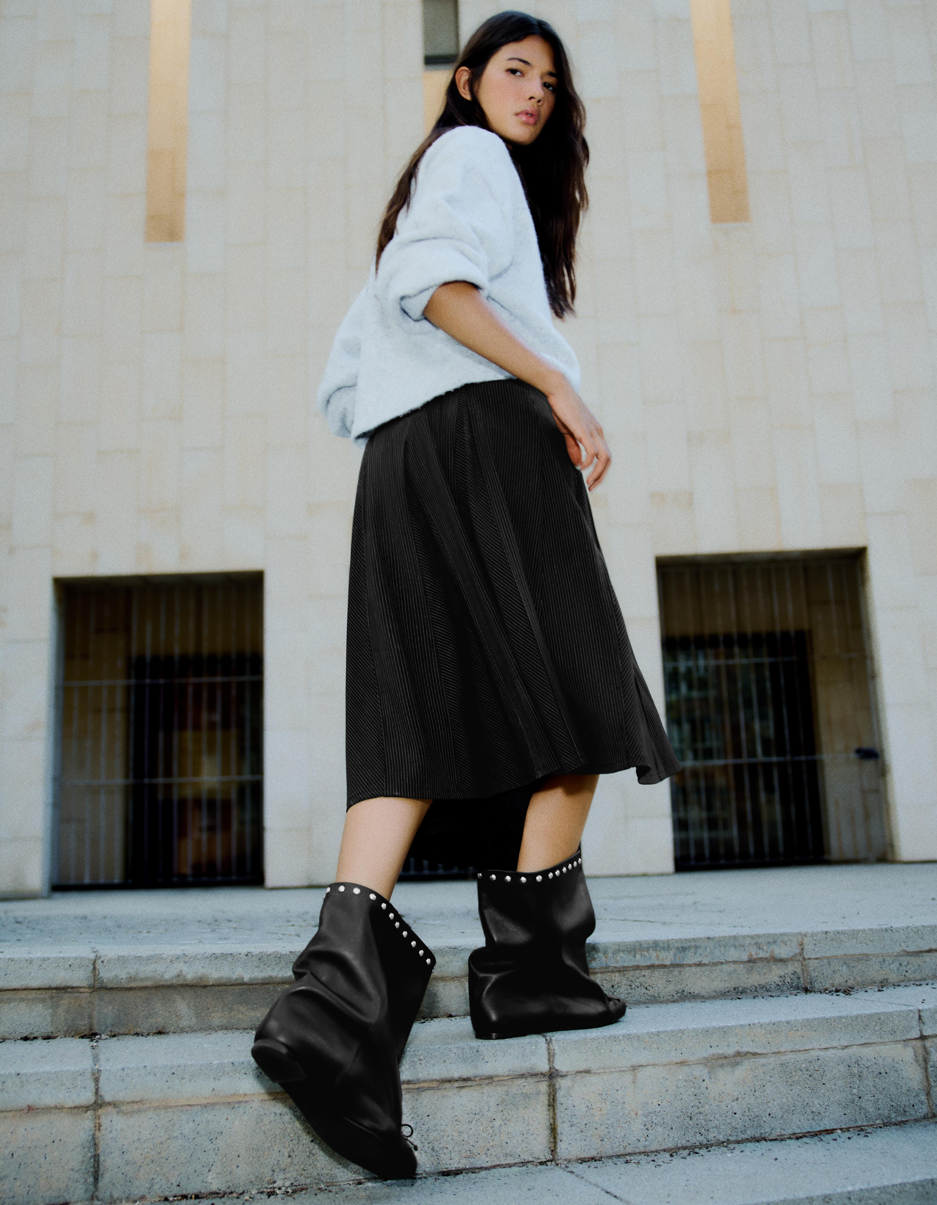 FLAT WIDE-SHAFT STUDDED LEATHER ANKLE BOOTS — BLACK