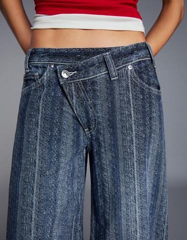 Textured crossover waist jeans — Blue 4