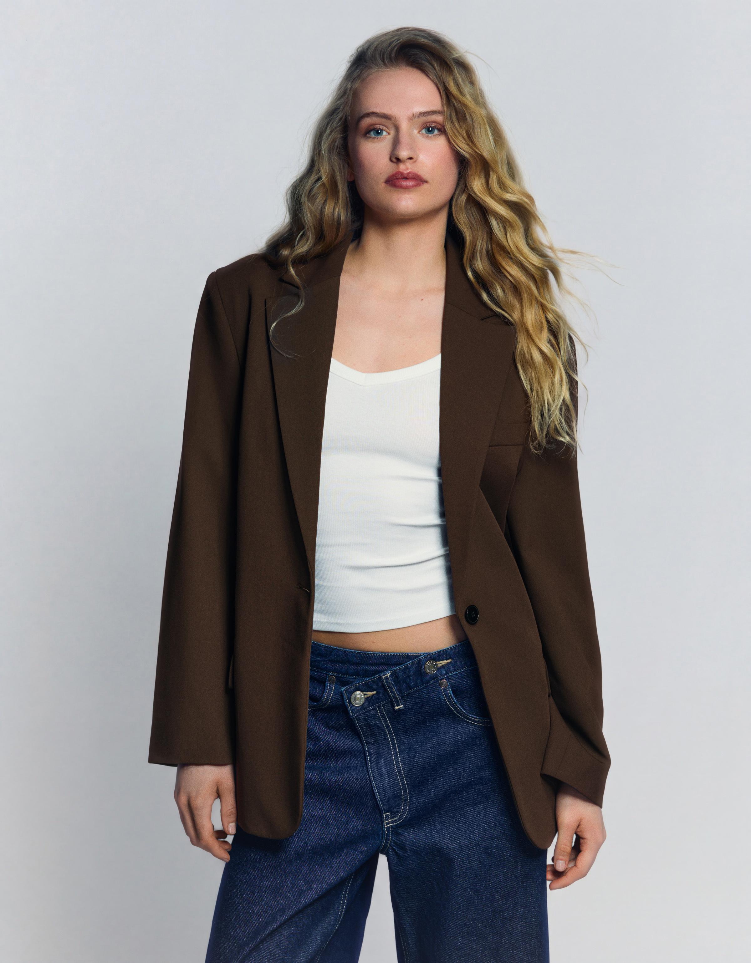Blazer with back buckle