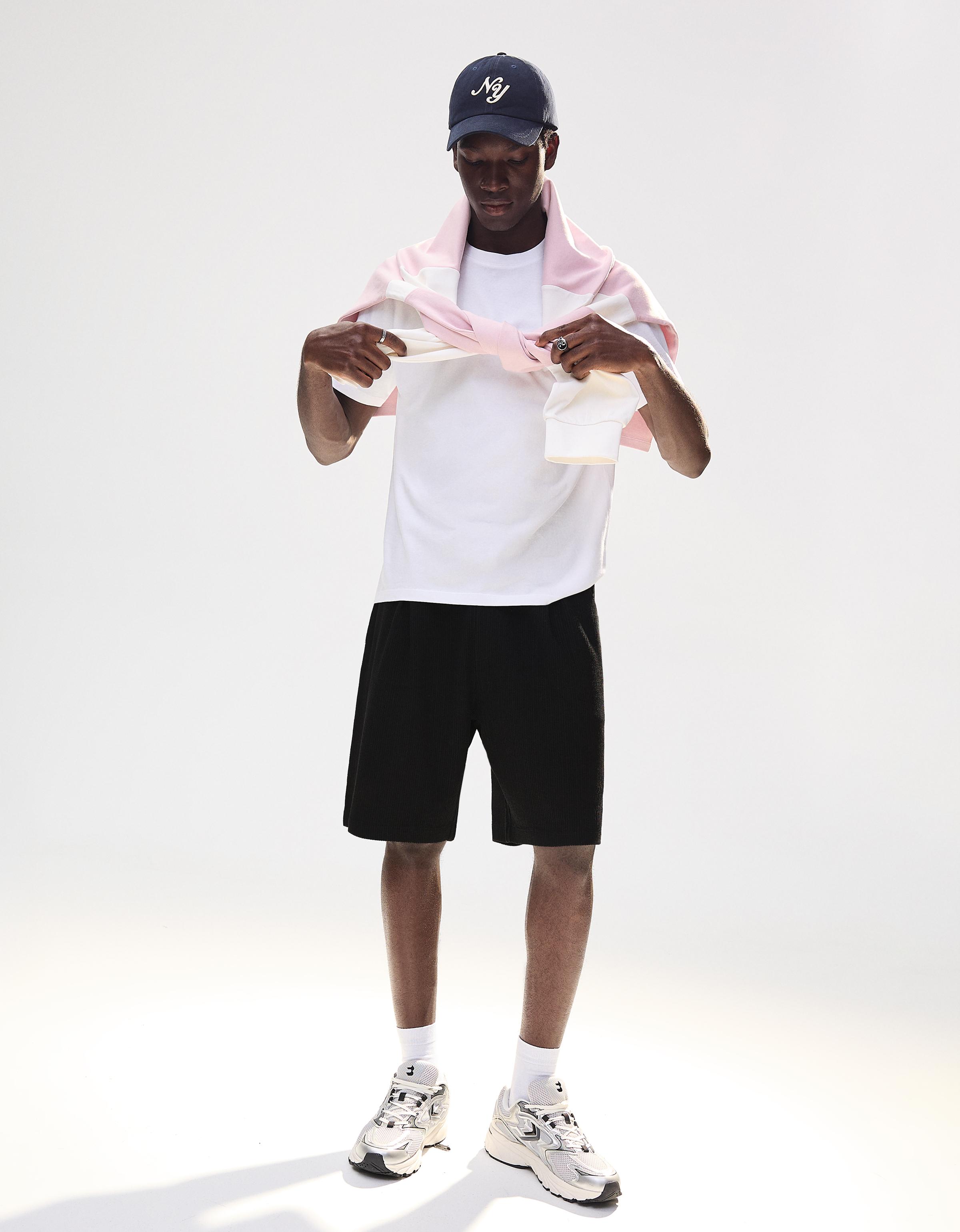 Textured plush Bermuda shorts — Black