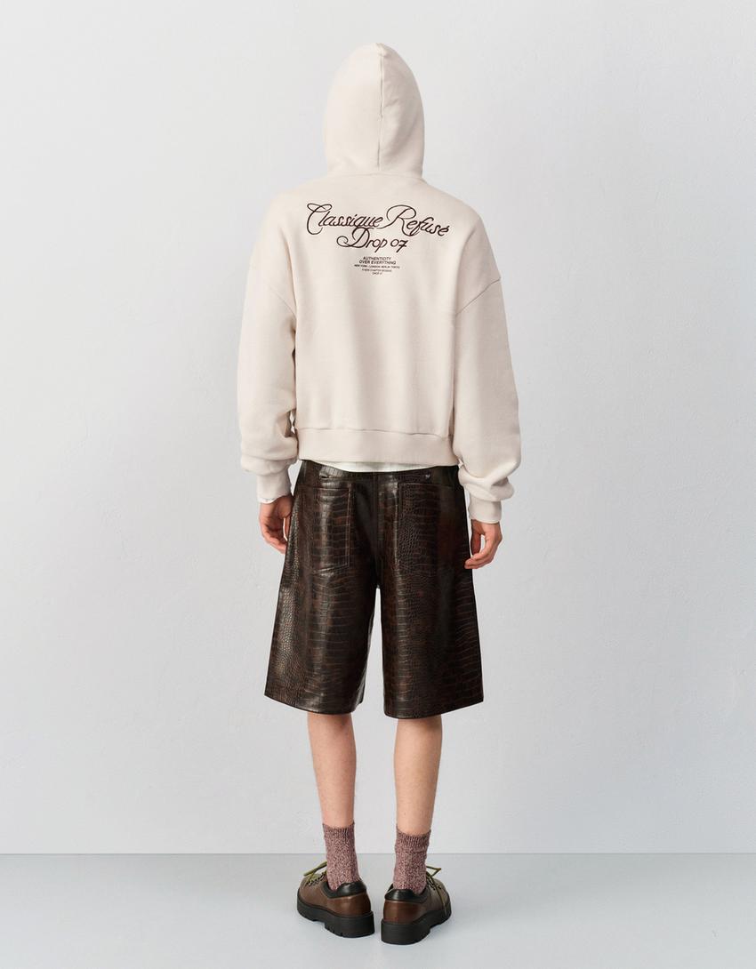 Hoodie met geborduurde print-Ecru